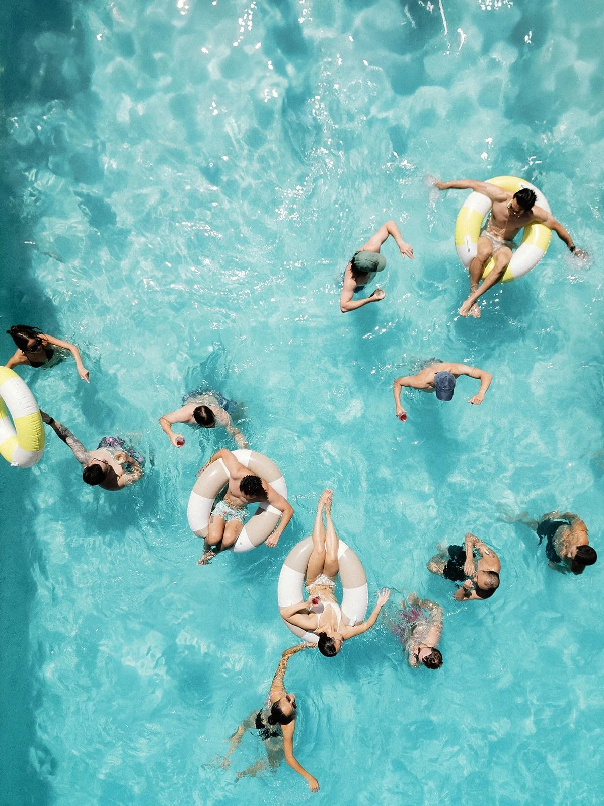 The Recovery Float for S&amp;H was a pool party with an ode to their swimming club college days. *swipe to the end to see a video sneak peak of the crazy tricks these guys were doing!*

A San Pellegrino hydration station and hangover-curing BBQ were 