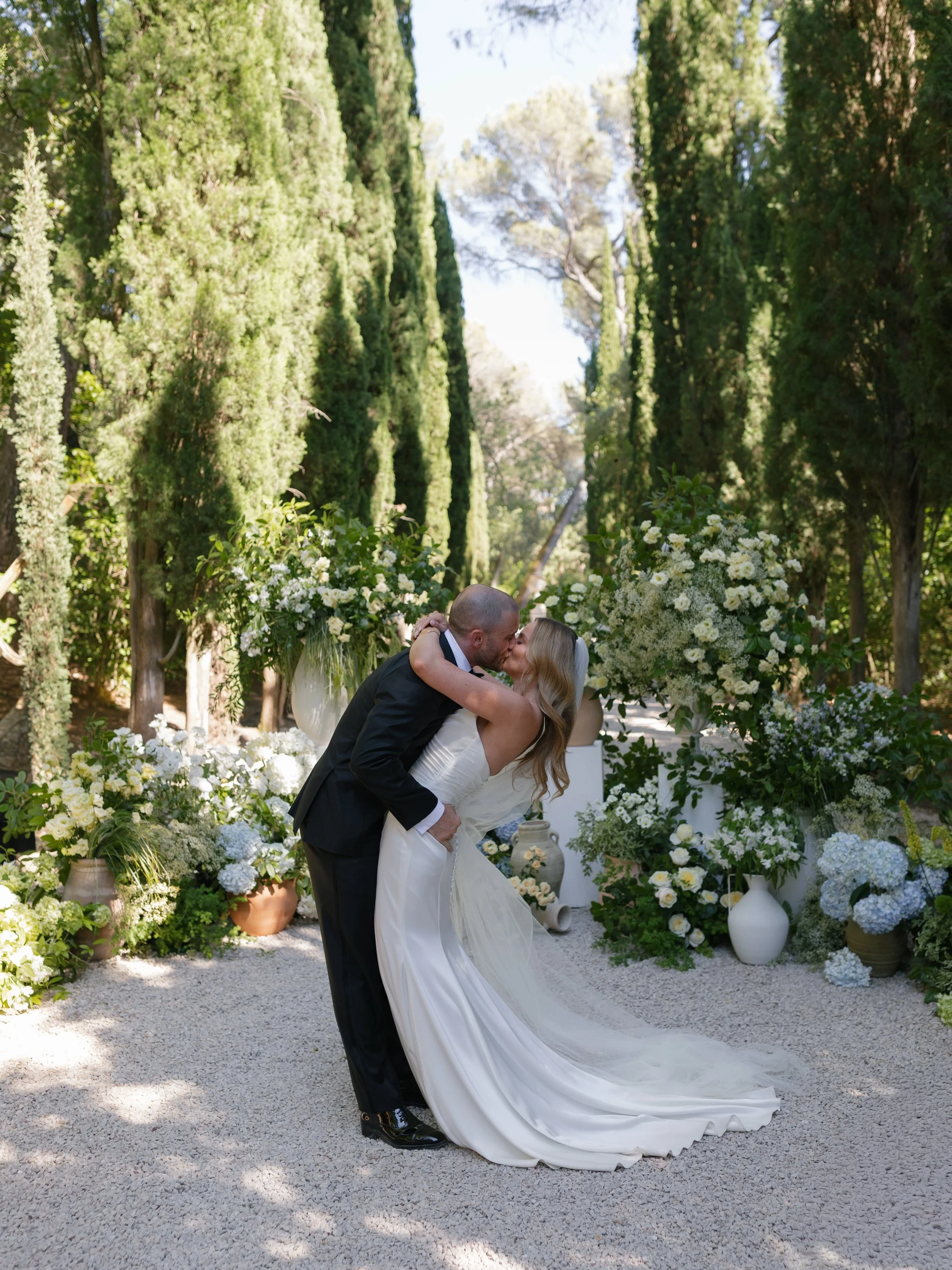 T&amp;H&rsquo;s ceremony took place at @chateaumartinay Cypress Walkway a space lined with iconic cedar trees. 

Letting the incredible natural setting speak for itself, we added colour and elevation using large mismatched pots of overflowing florals