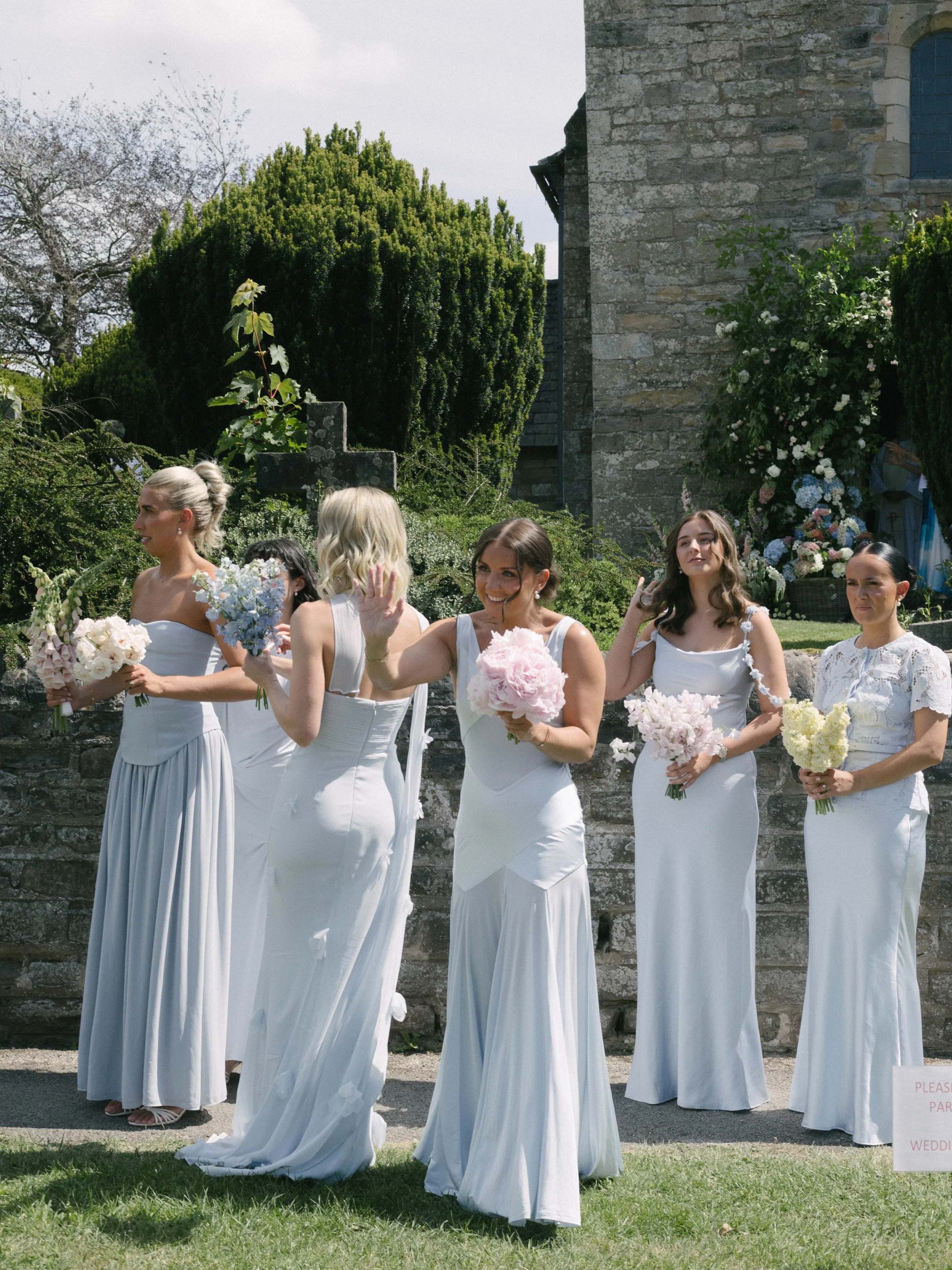 E&amp;Js wedding at their private began in the quaint local church just 2 minutes down the road. 

We dressed the entrance with a beautiful floral arch full of foliage and dainty pastel coloured British blooms. The church alter itself was abundant wi