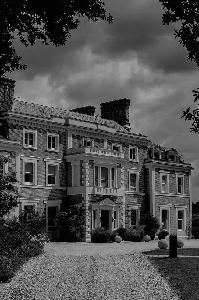 UK wedding planner styling a grand couple entrance at Heckfield Place country house wedding venue