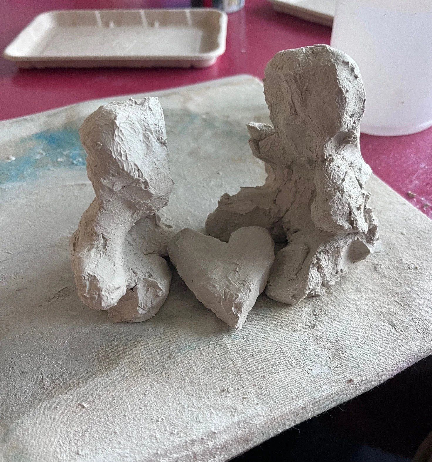 Couples work in clay