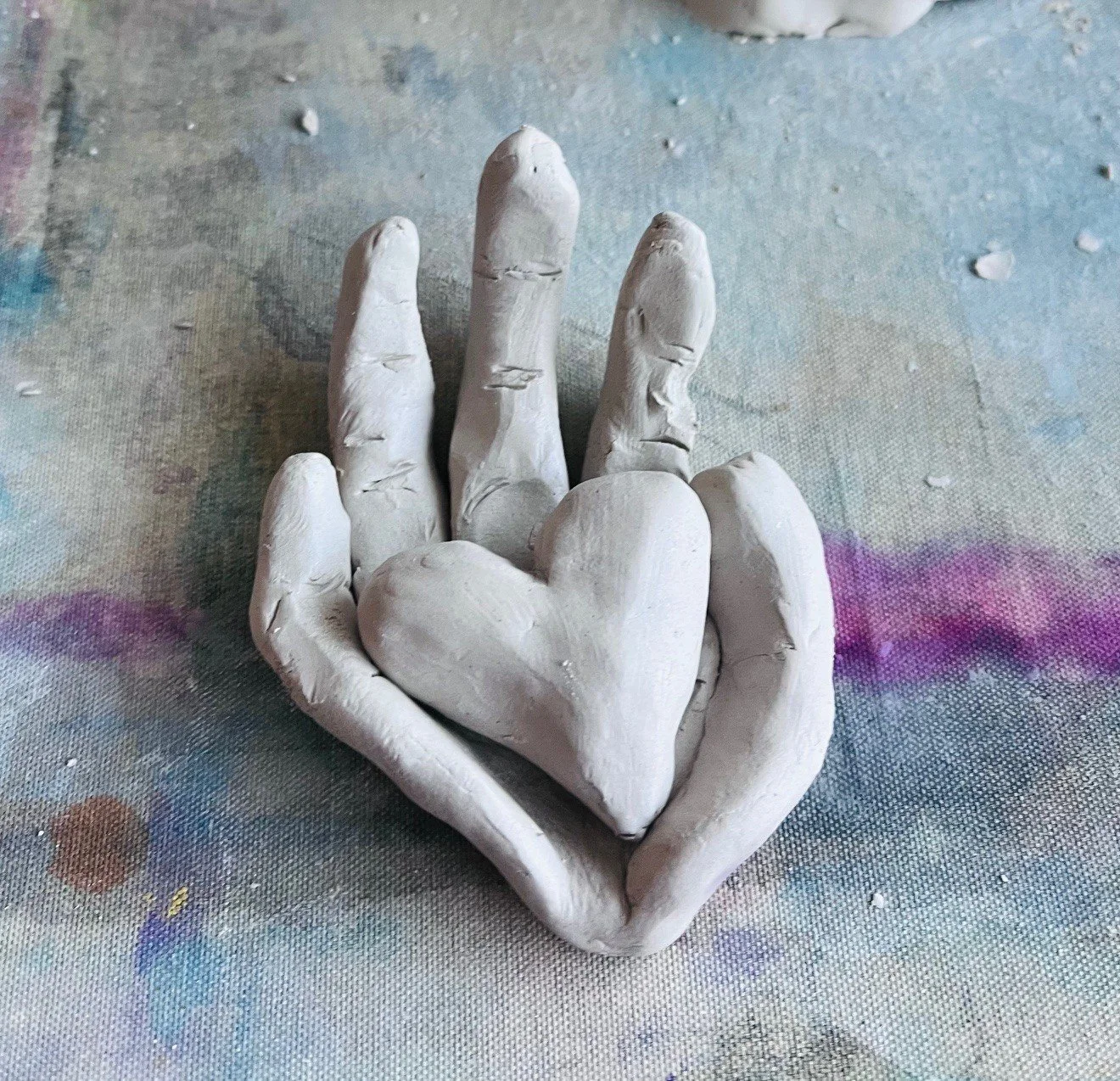 Couples work in clay