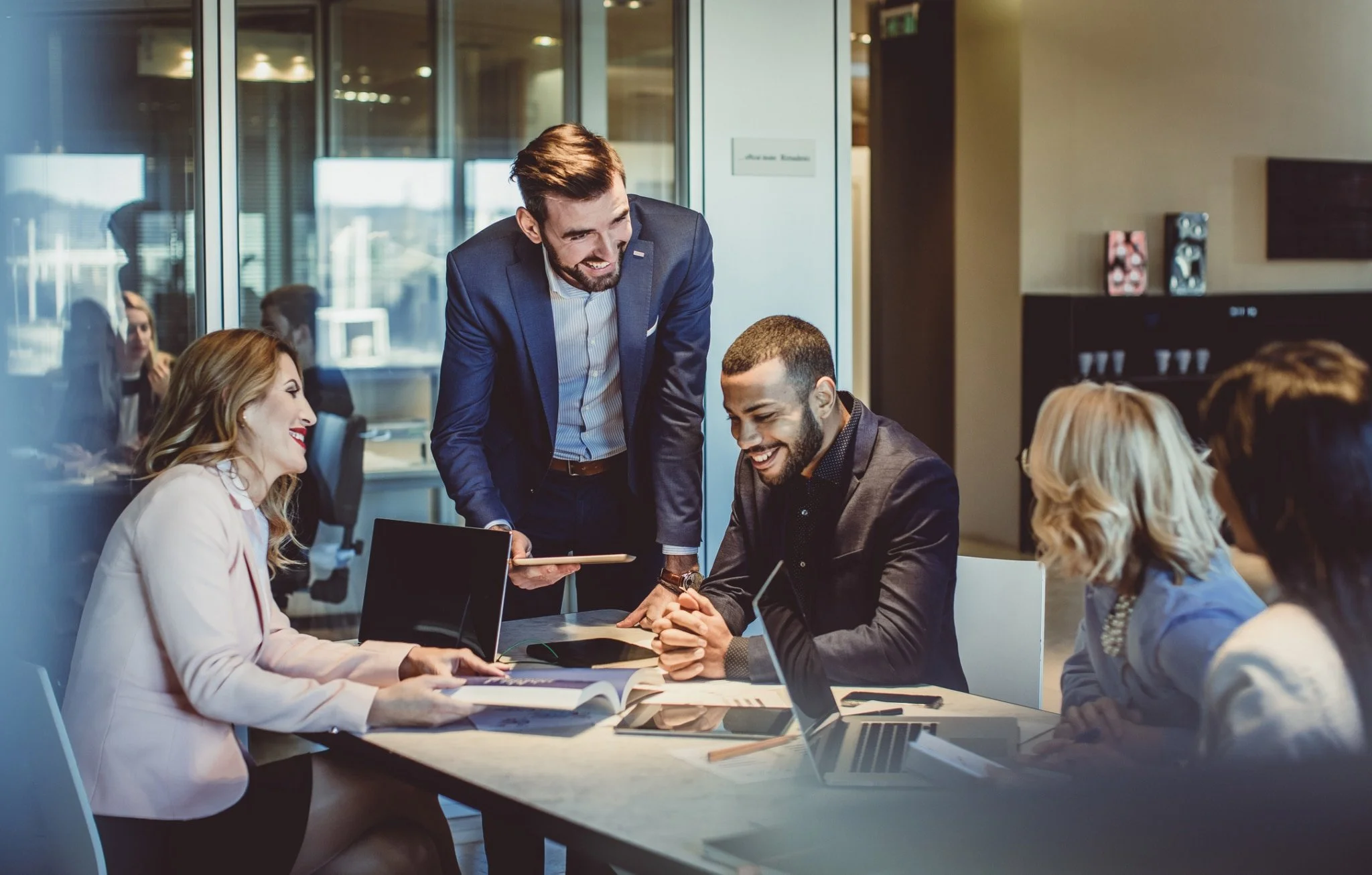business-people-working-in-the-office-scaled.jpg