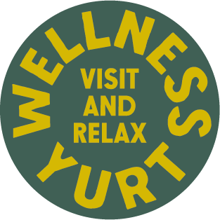 Circular sign with yellow and green colors that says "Wellness Yurts. Visit and Relax."