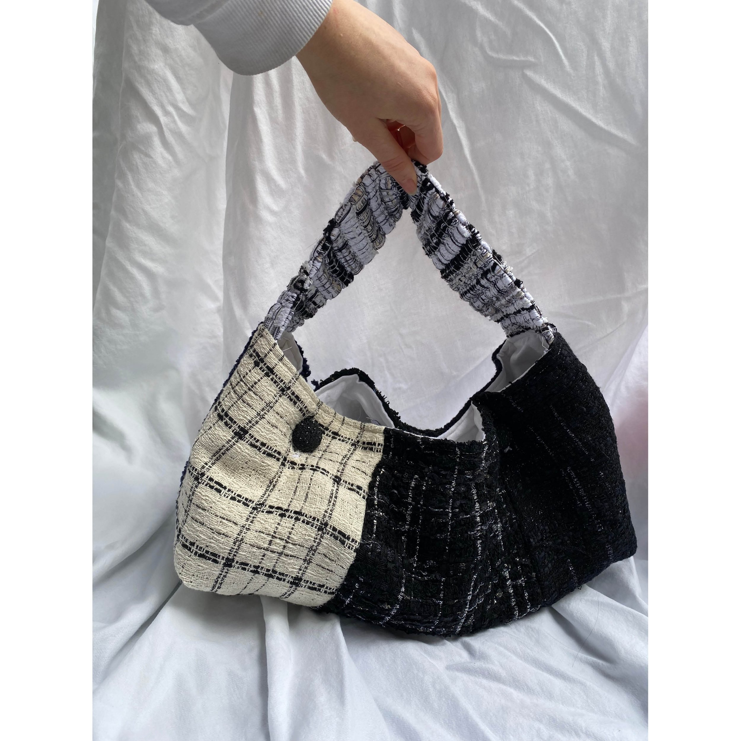 black and white patchwork weave bag