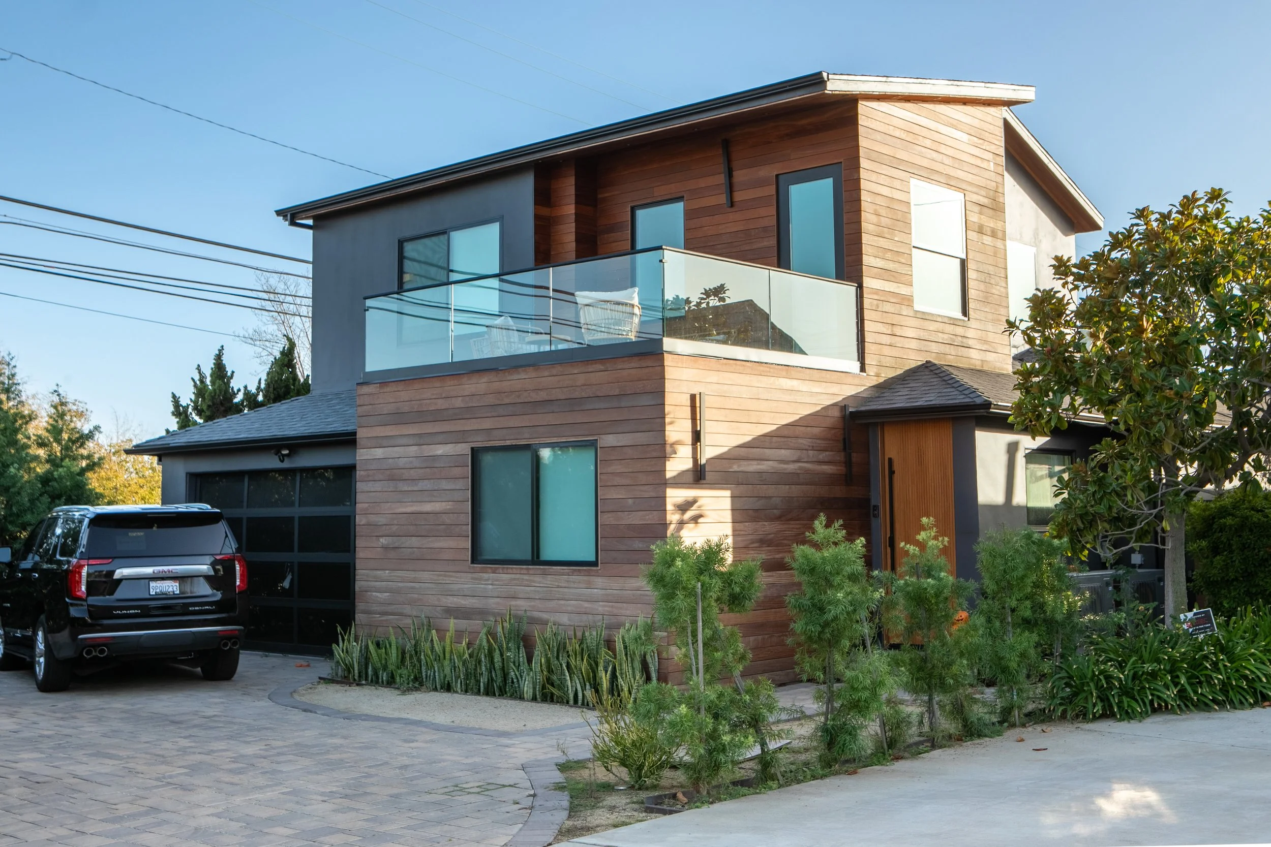 An edge on view of the 2 story addition at the house.