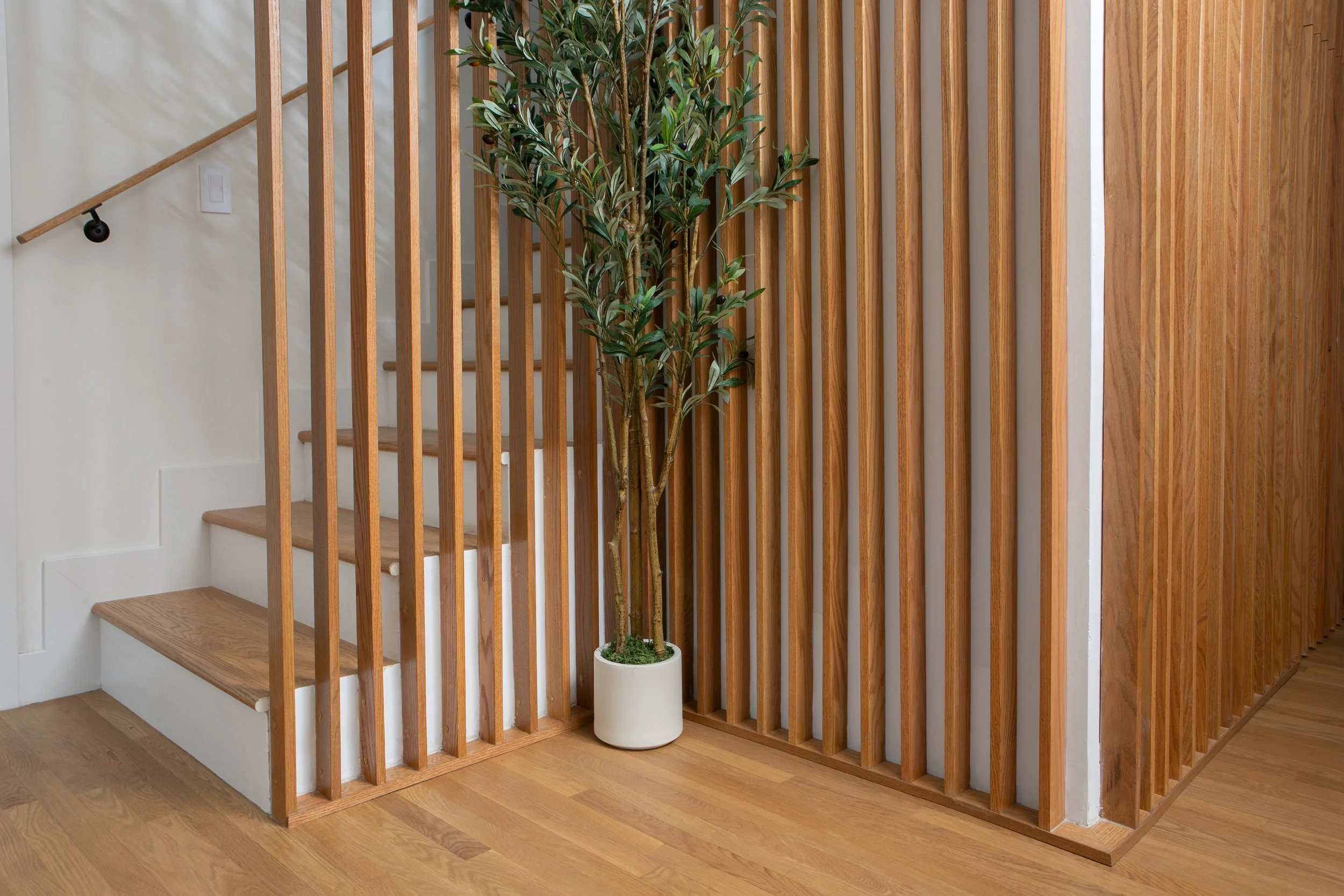 Feature stair with hidden storage.