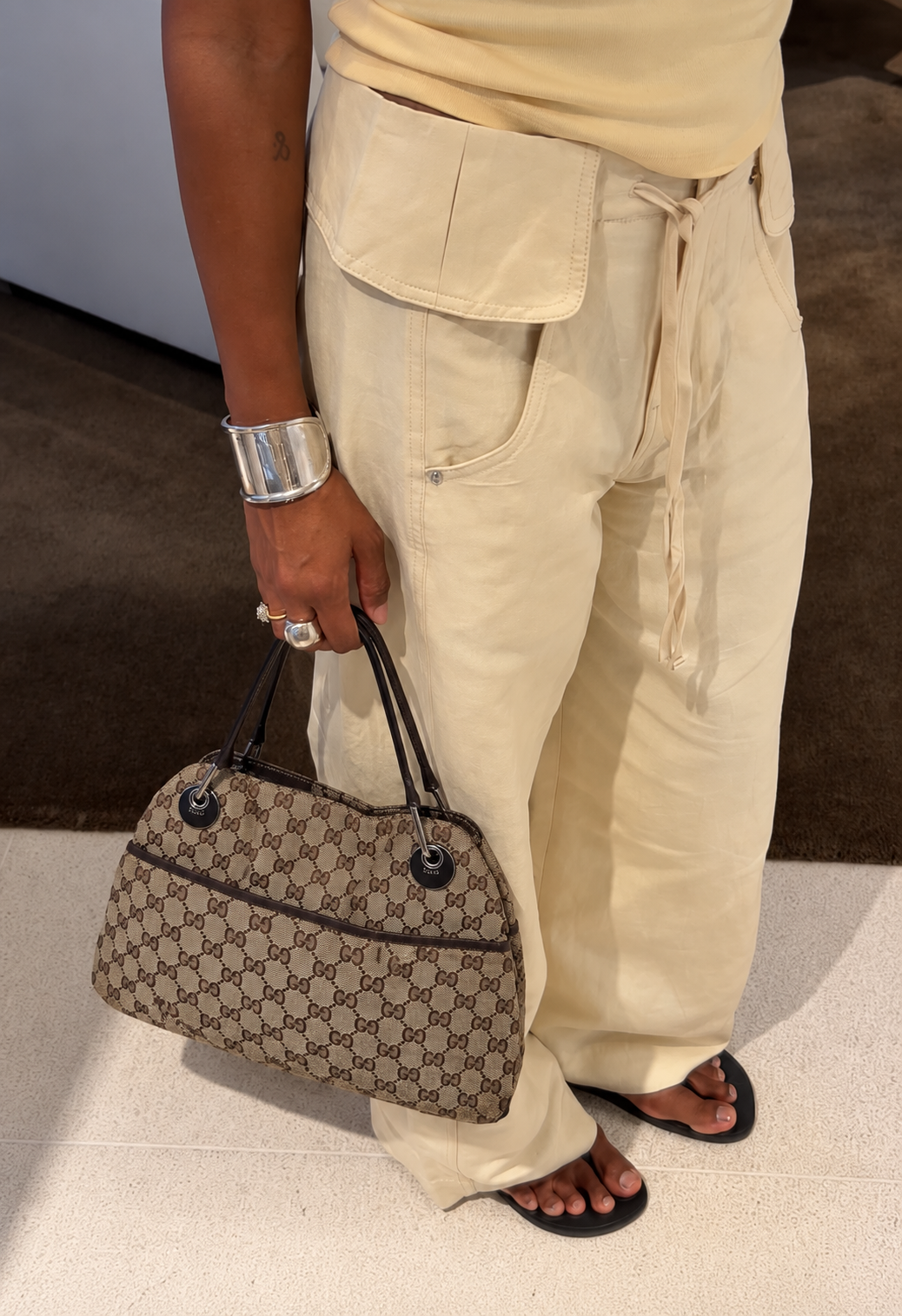 Gucci Monogram Tote with Neutral Streetwear.png