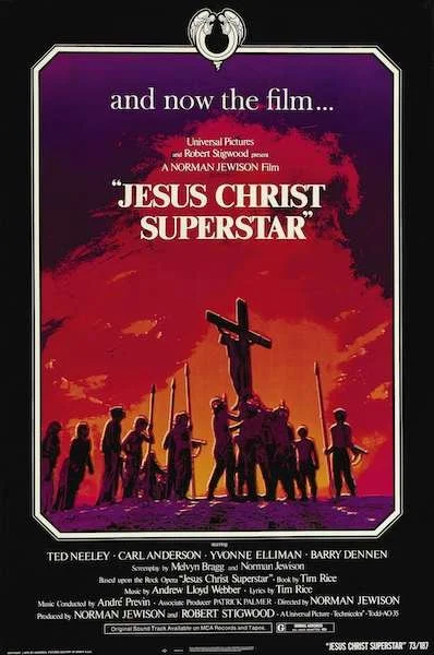 A poster for the movie Jesus Christ Superstar, featuring a painting of the crucifixion.