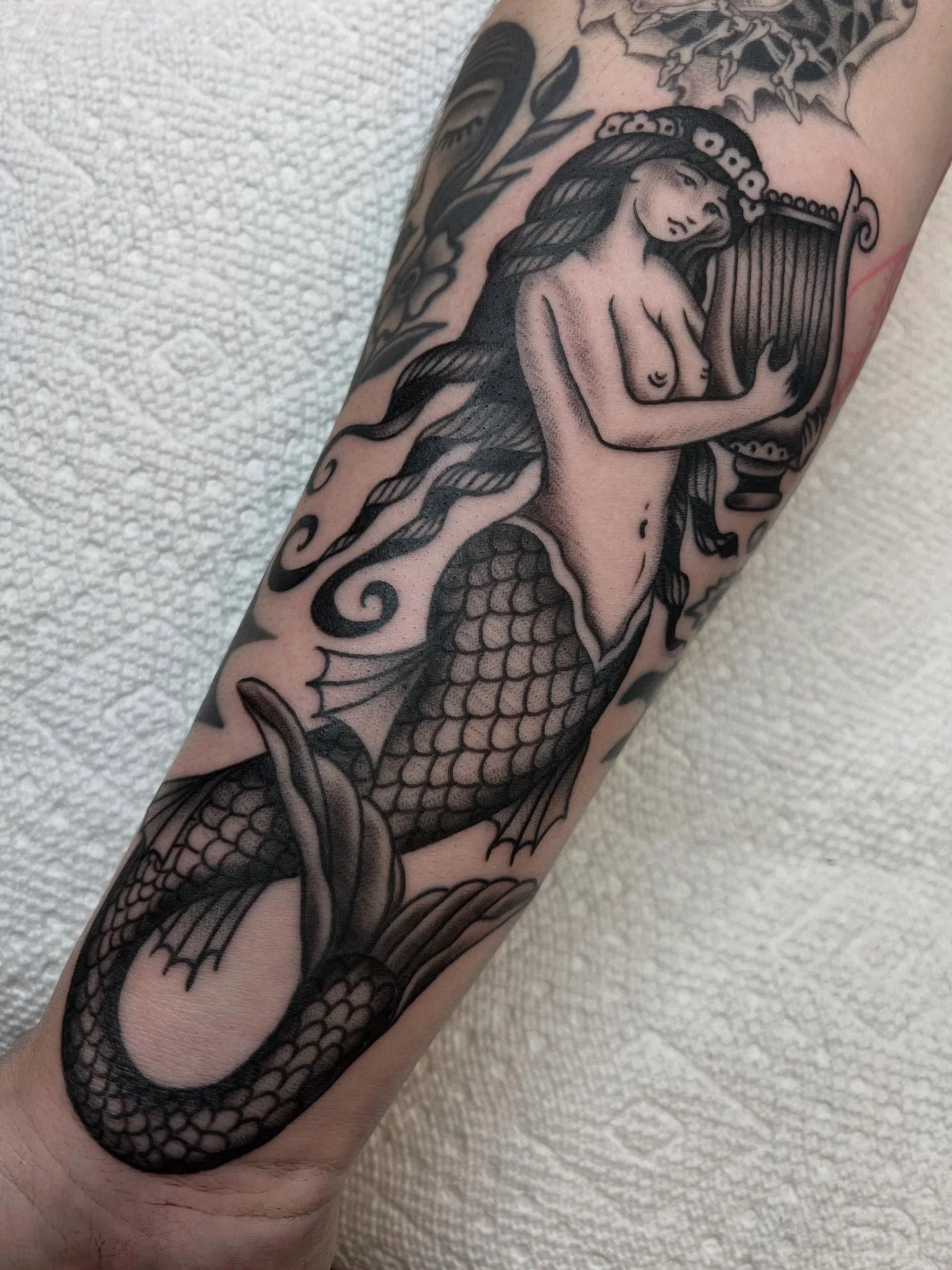 I love mermaids! Thank you Alethia :)
@grizzlytattoo