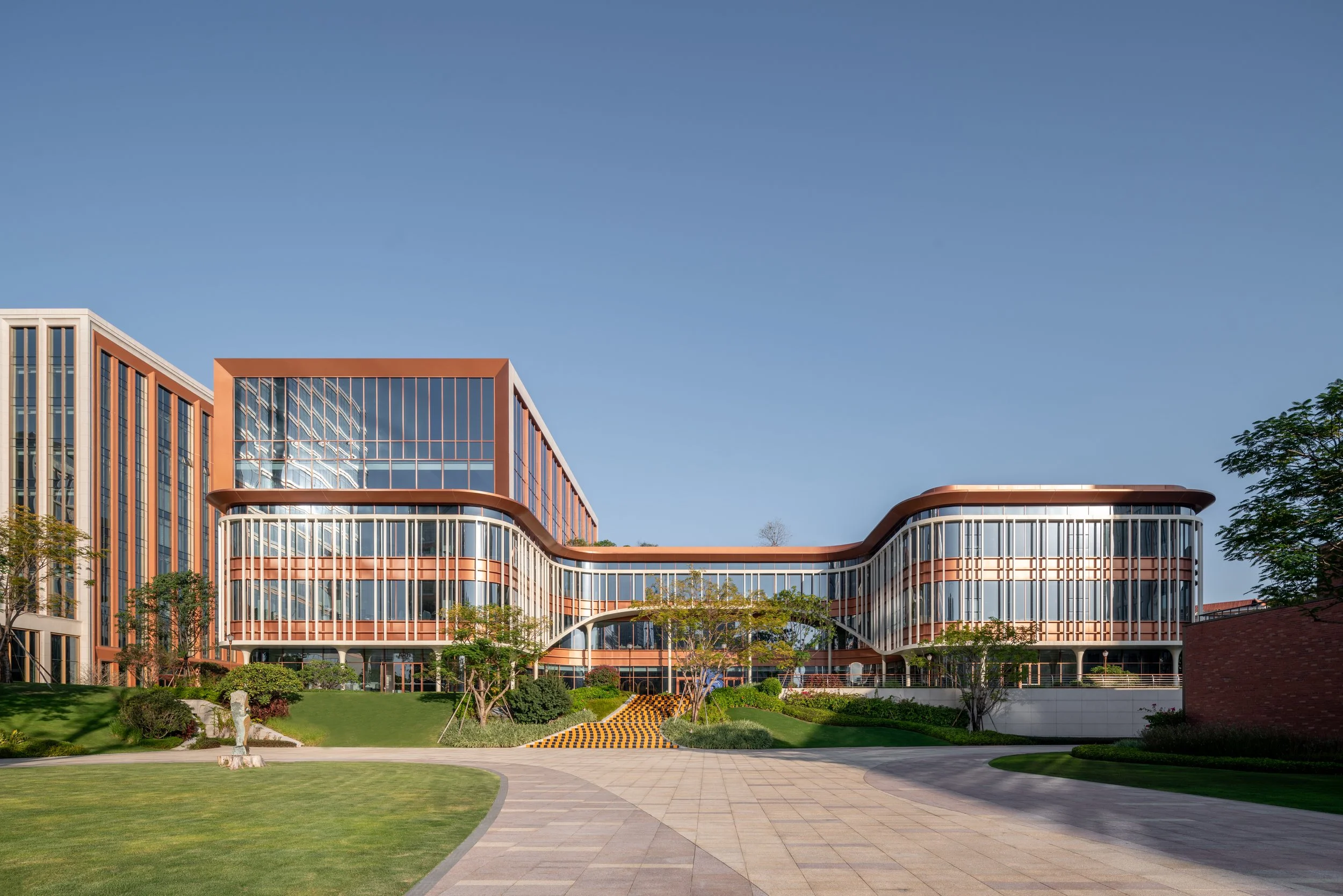 The buildings within the park enclose public spaces.