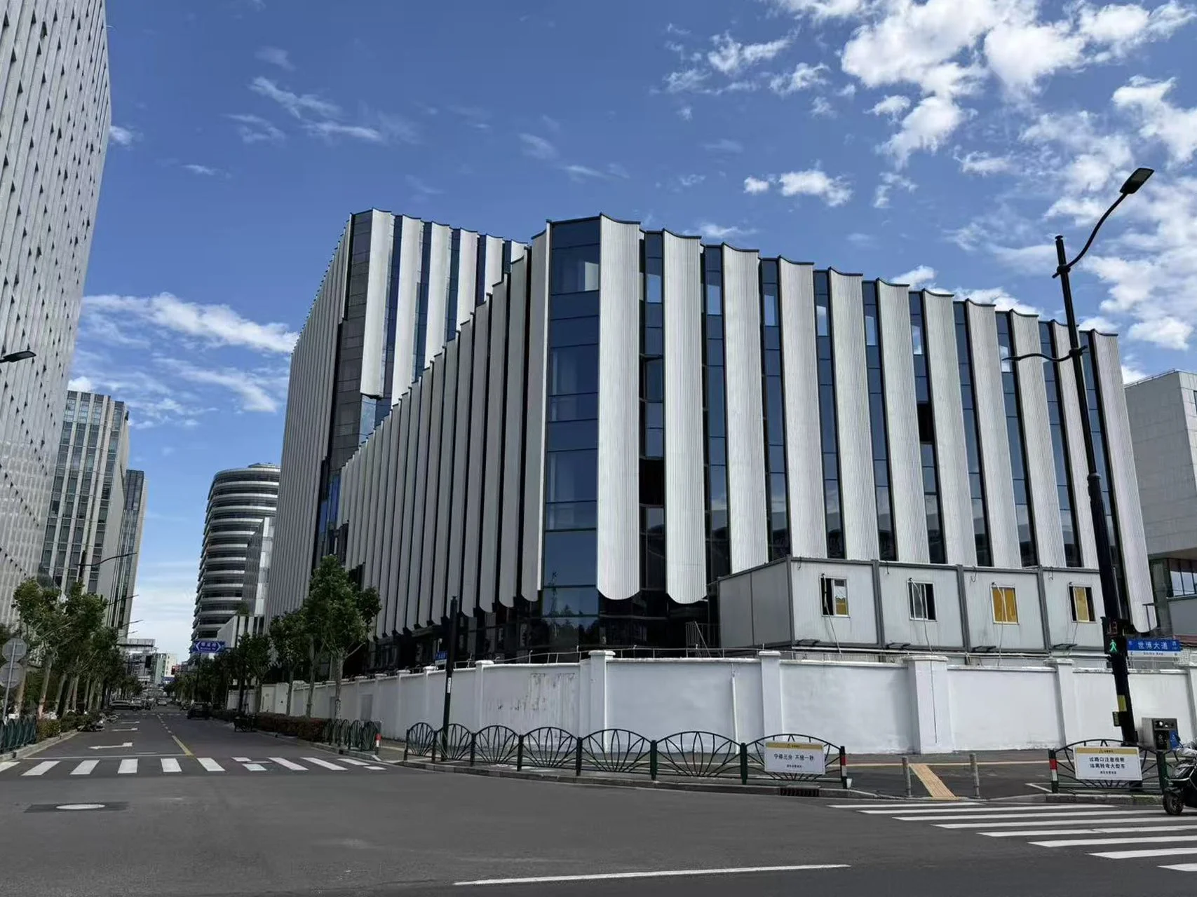 VIEW OF STONE AND GLASS FACADE