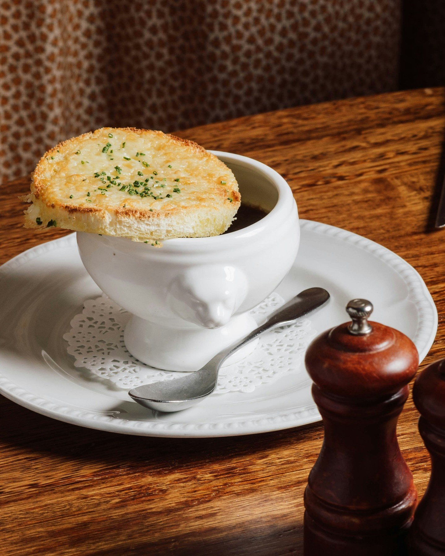 Perfect for this cold snap ~ French onion soup ~ slow caramelized onion, madeira, veal broth, gruyere crostini.