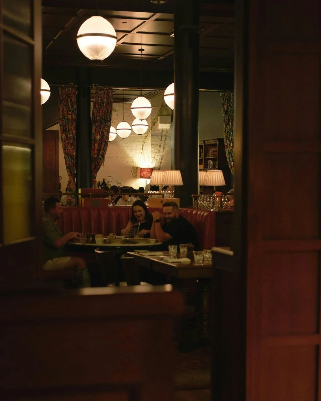 Moody lighting, red leather booths, the smells of sizzling steak and the sound of red wine pouring. Where would you rather be?