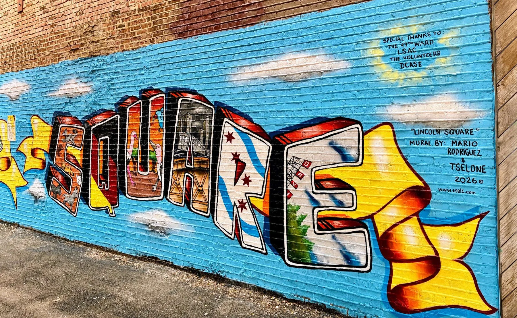 Completed Lincoln Square mural in Chicago featuring colorful graffiti-style SQUARE lettering, neighborhood imagery, and a yellow ribbon against a blue brick wall.