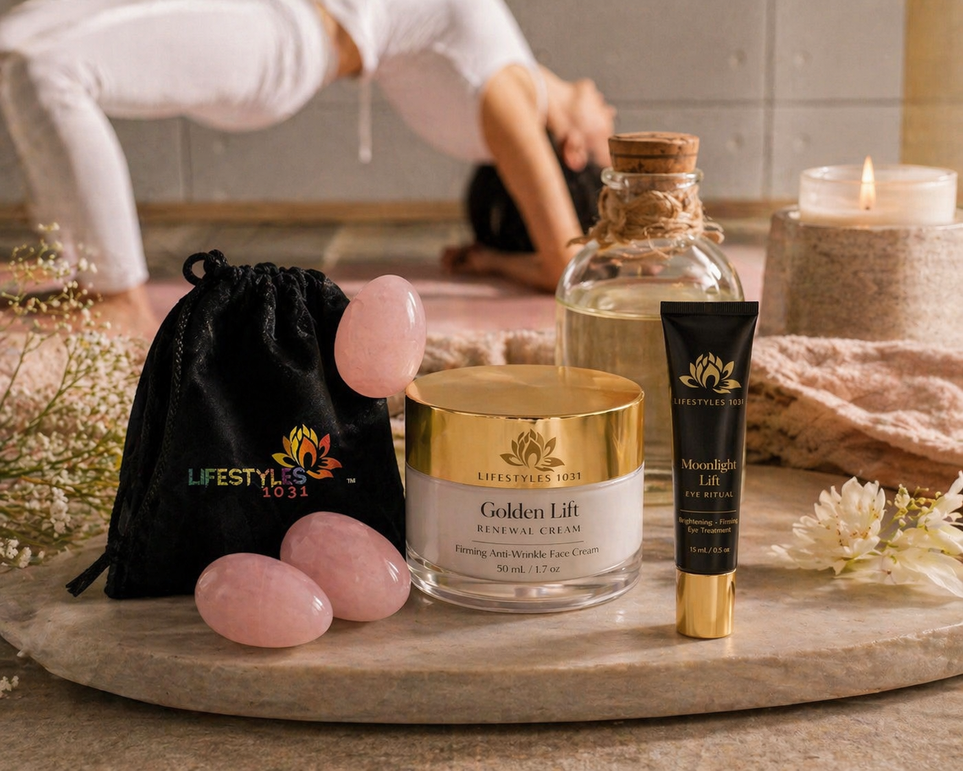 Skincare and wellness products arranged on a stone surface, including a jar of Golden Lift Renewal Cream, a tube of Moonlight Lift Eye Ritual, rose quartz stones, a pink seed, a black drawstring bag with the Lifestyles 1031 logo, and a lit candle in the background.