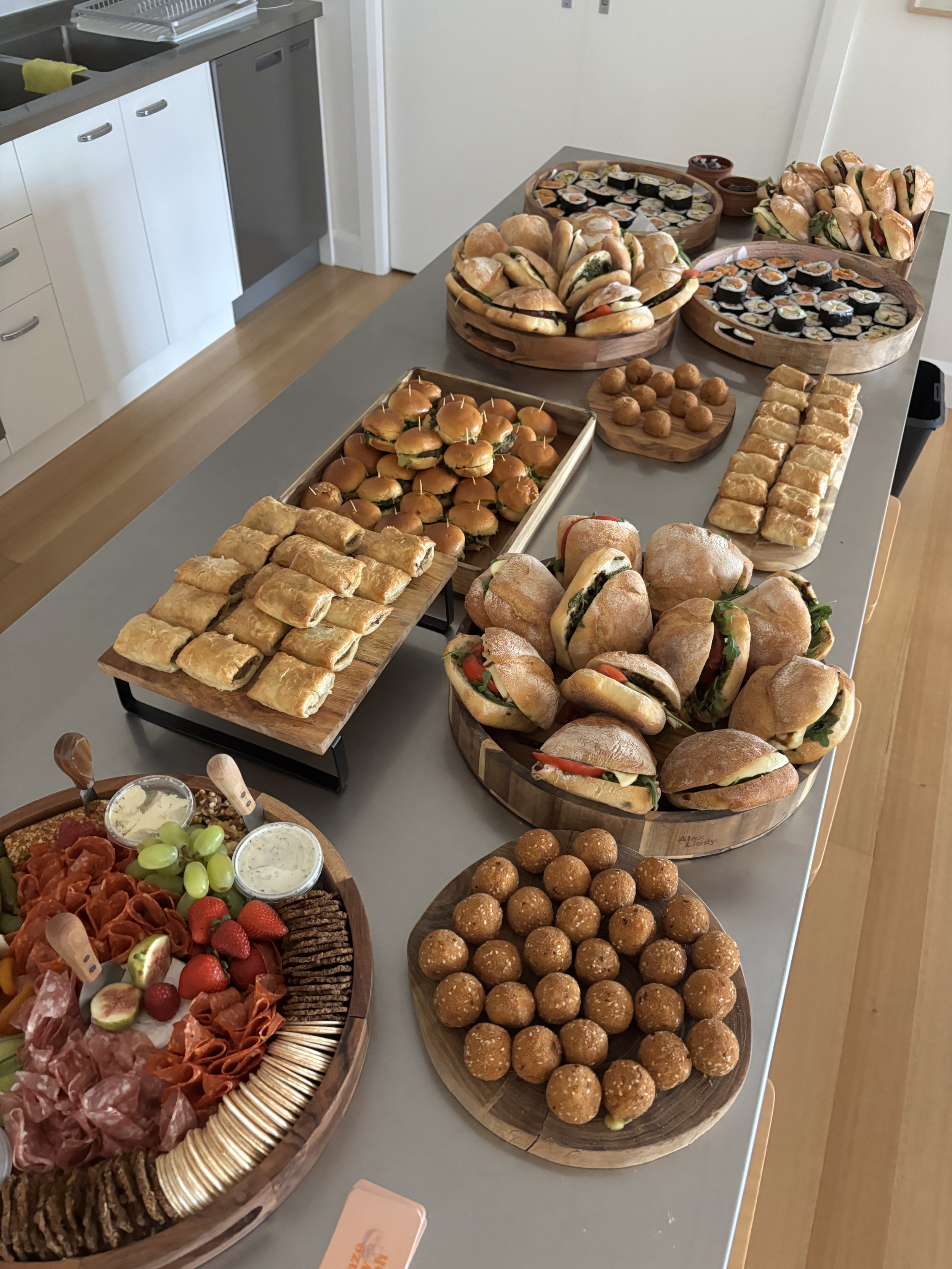 Arancini, sausage rolls, panini, sliders, sushi