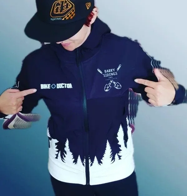 Rider wearing  a Softshell Mountain Bike Waterproof Freerider Apparel  Jacket