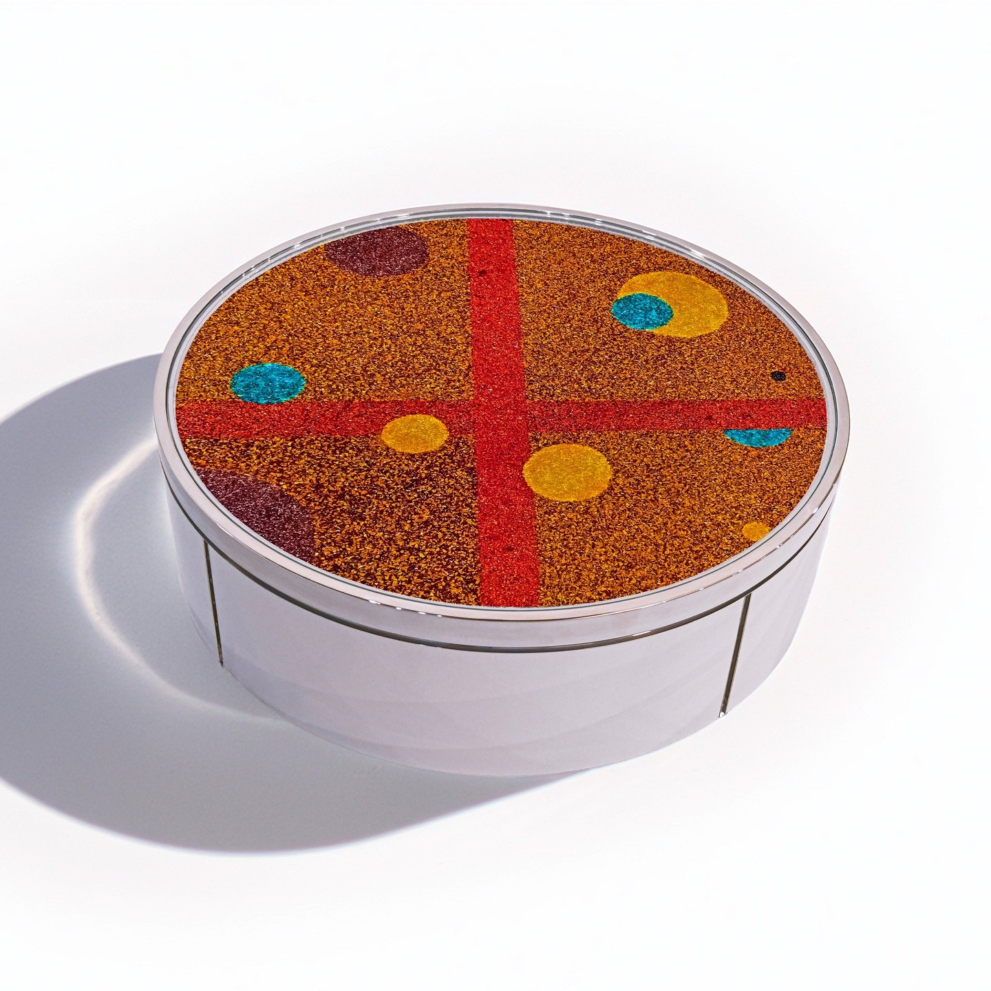 This isn't your average coffee table. This is "Spheres &amp; Quadrants," a testament to what happens when boundaries are pushed in design. Picture this: KalaRara's Rome studio, where Murano glass crystals are meticulously fused with acrylic