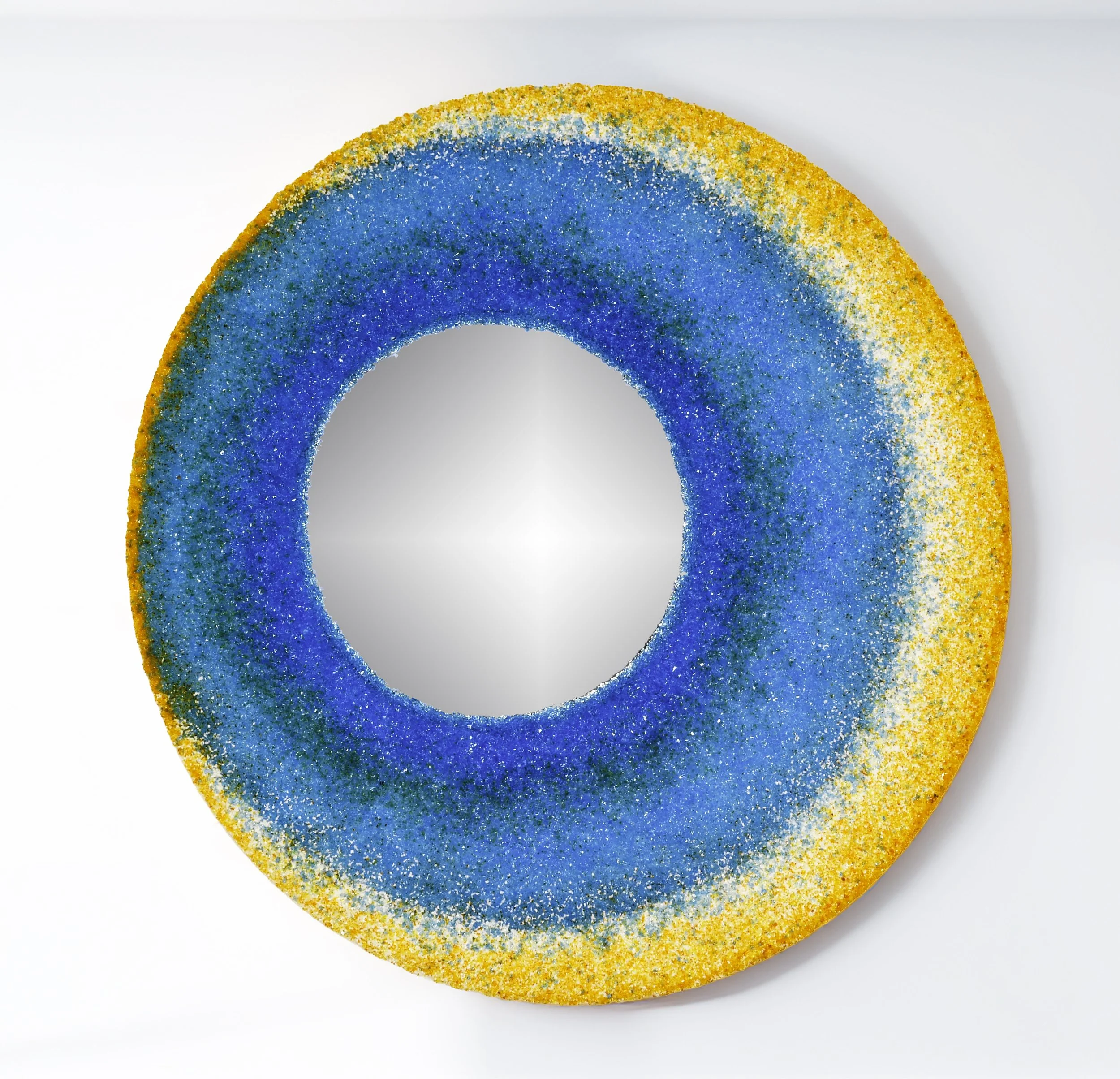 One-of-a-kind circular mirror handcrafted in Rome using MicroCristallo Fusione™ with Murano glass crystals in luminous Mediterranean blues and gold.