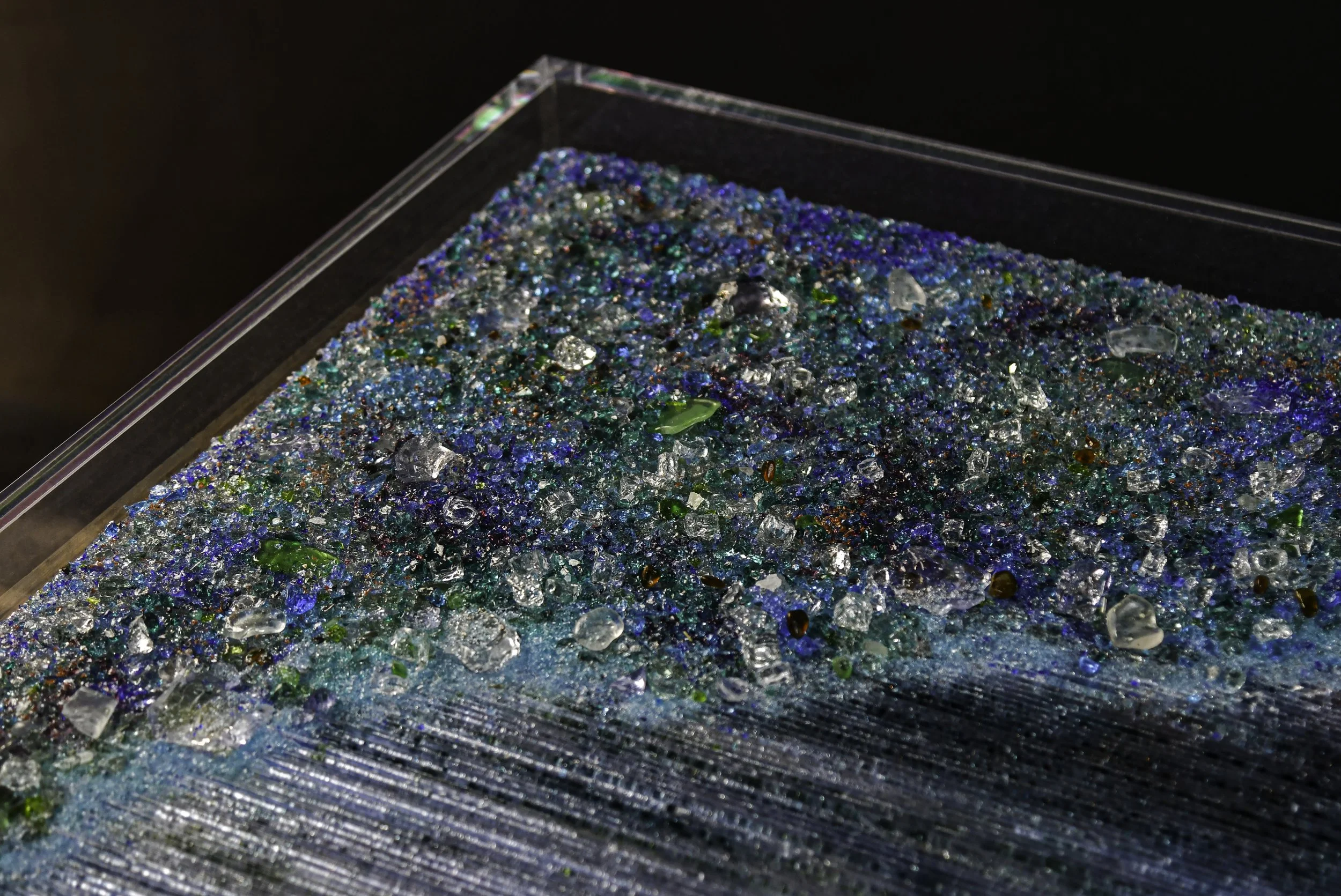 Transparent plexiglass cube base secured with precision dowels