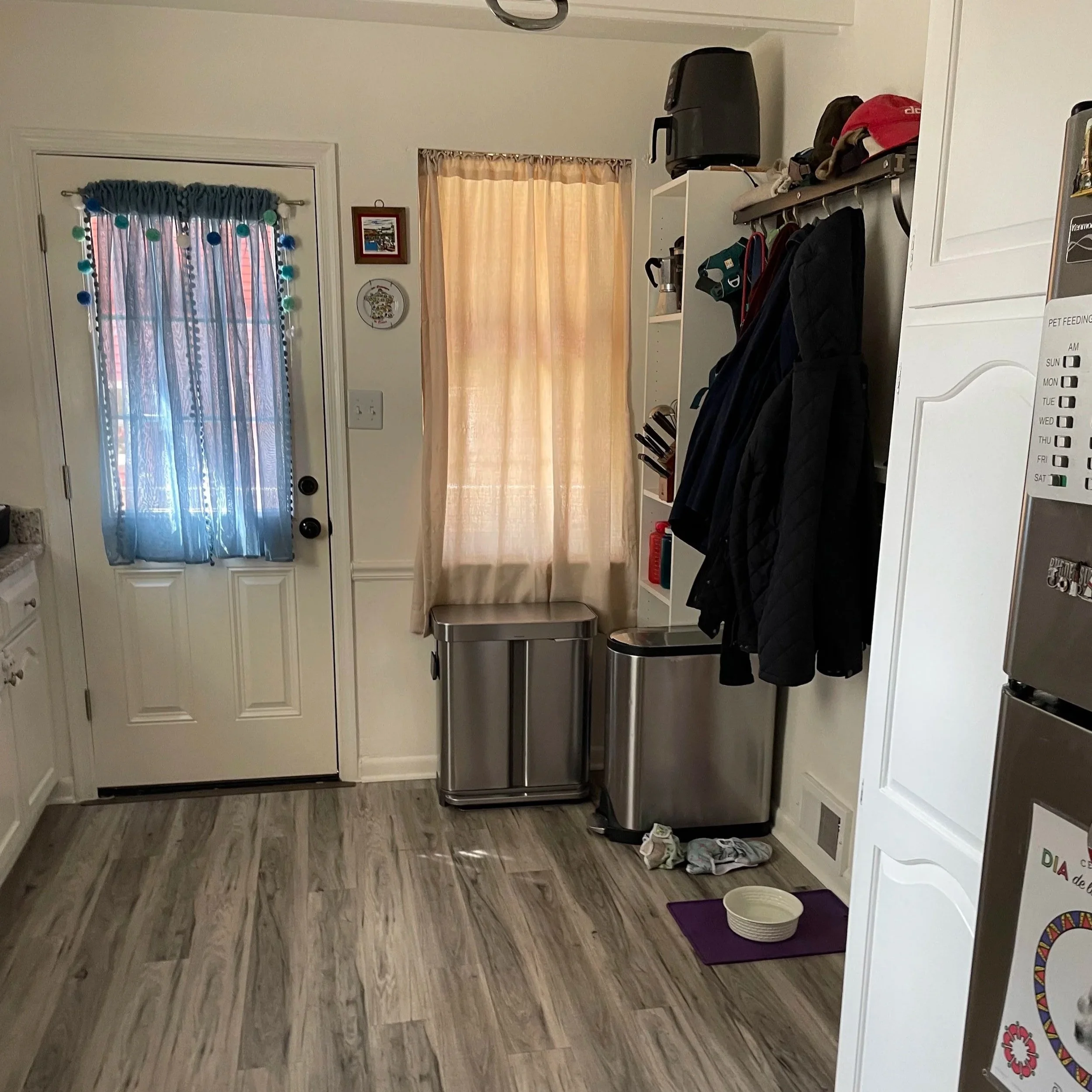Before: Remove existing short wall adjacent to window.