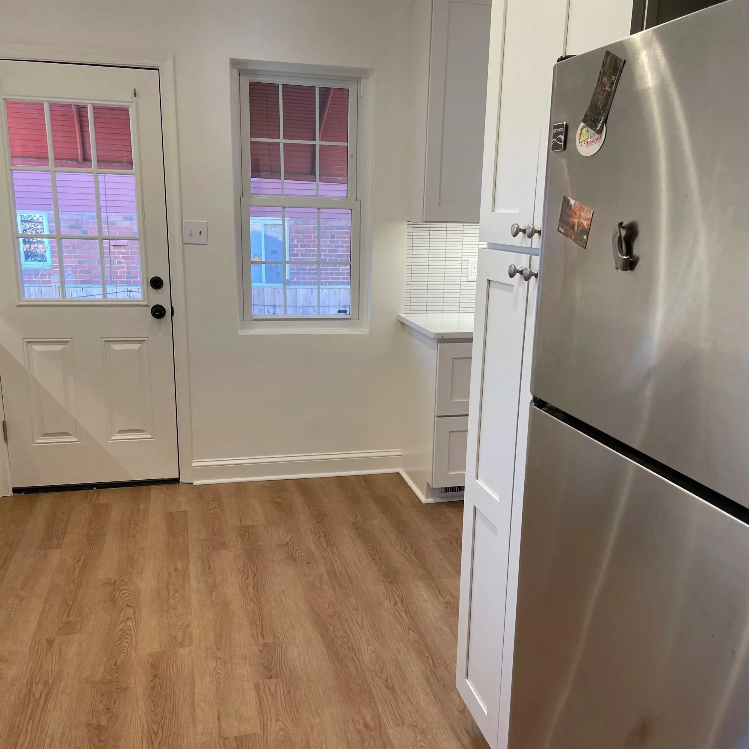 After: Removal of wall opens the space.