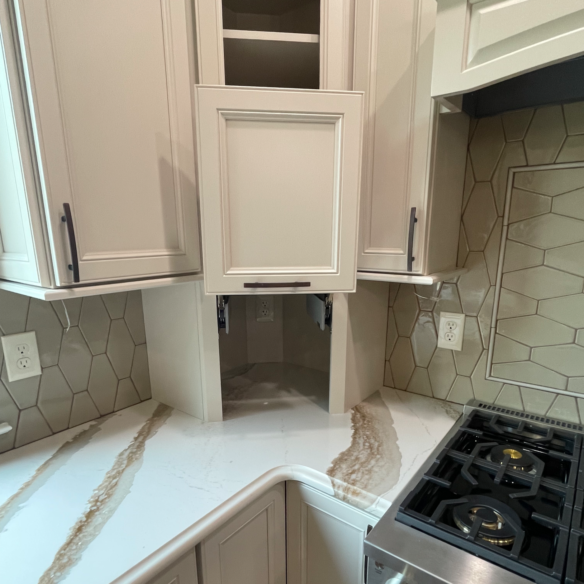 Open appliance garage used to conceal small, frequently used appliances like toasters, blenders, or coffee makers.