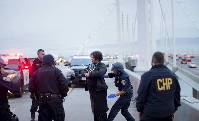 Ira arrest on bridge.jpeg