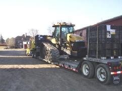 242_tractor_and_seed_on_trailer.jpeg