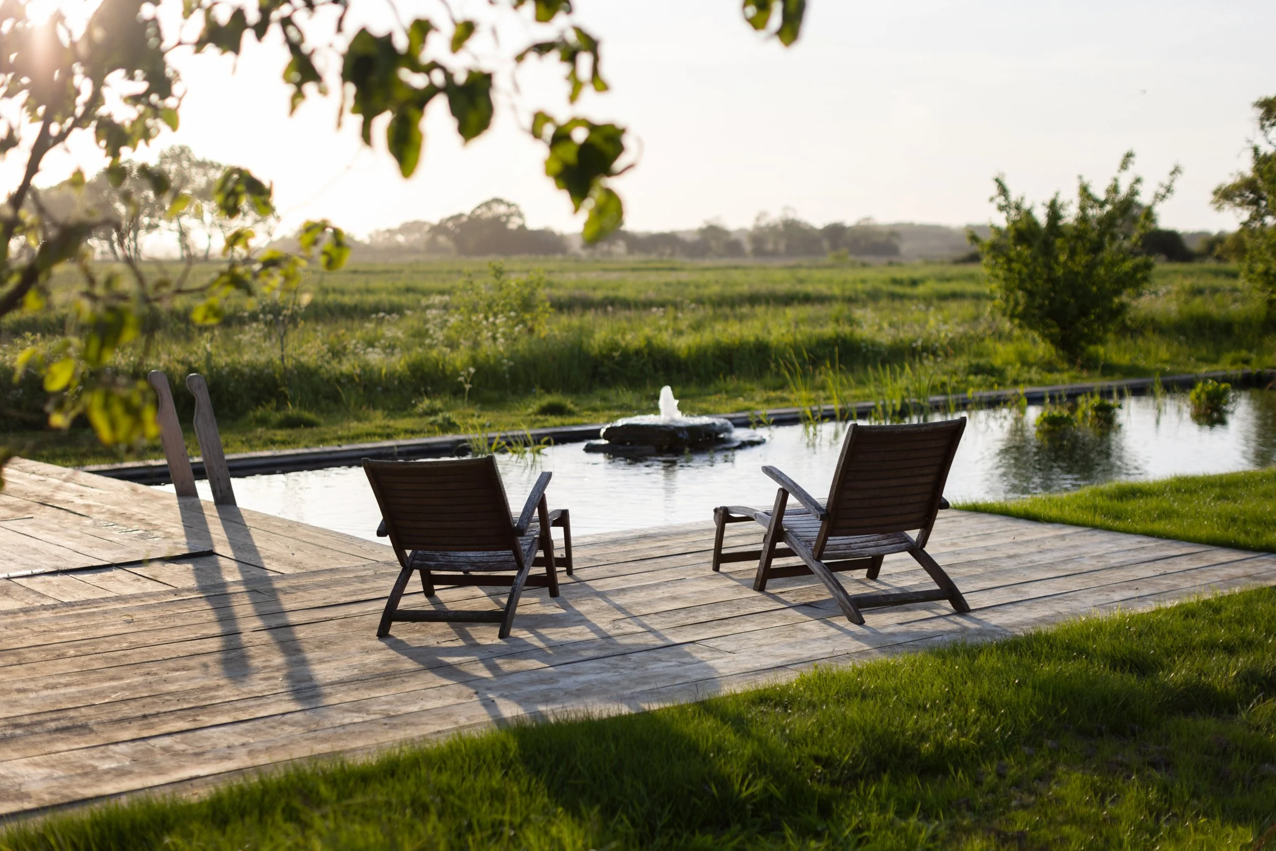 The deck of the natural swimming pool at Husk