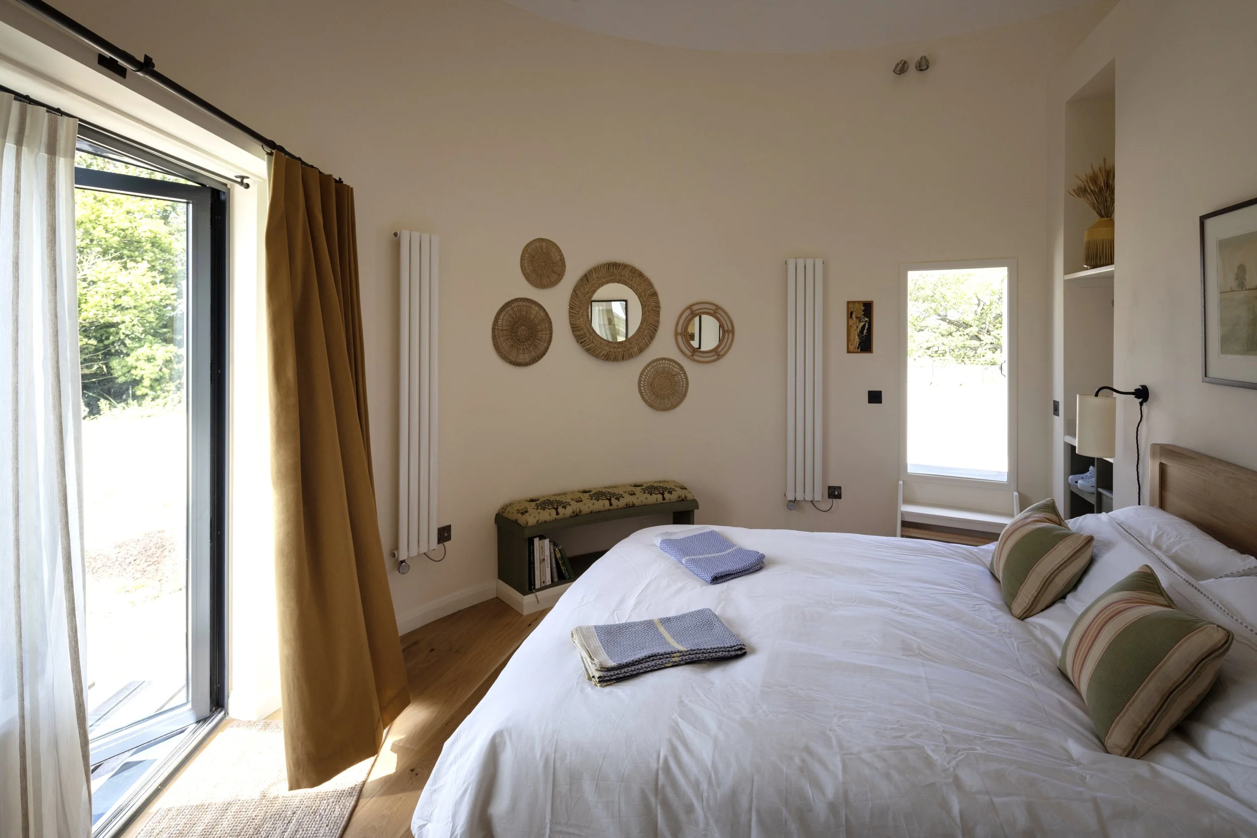 Wheaty tones, crisp sheets and Mungo towels in Emmer.