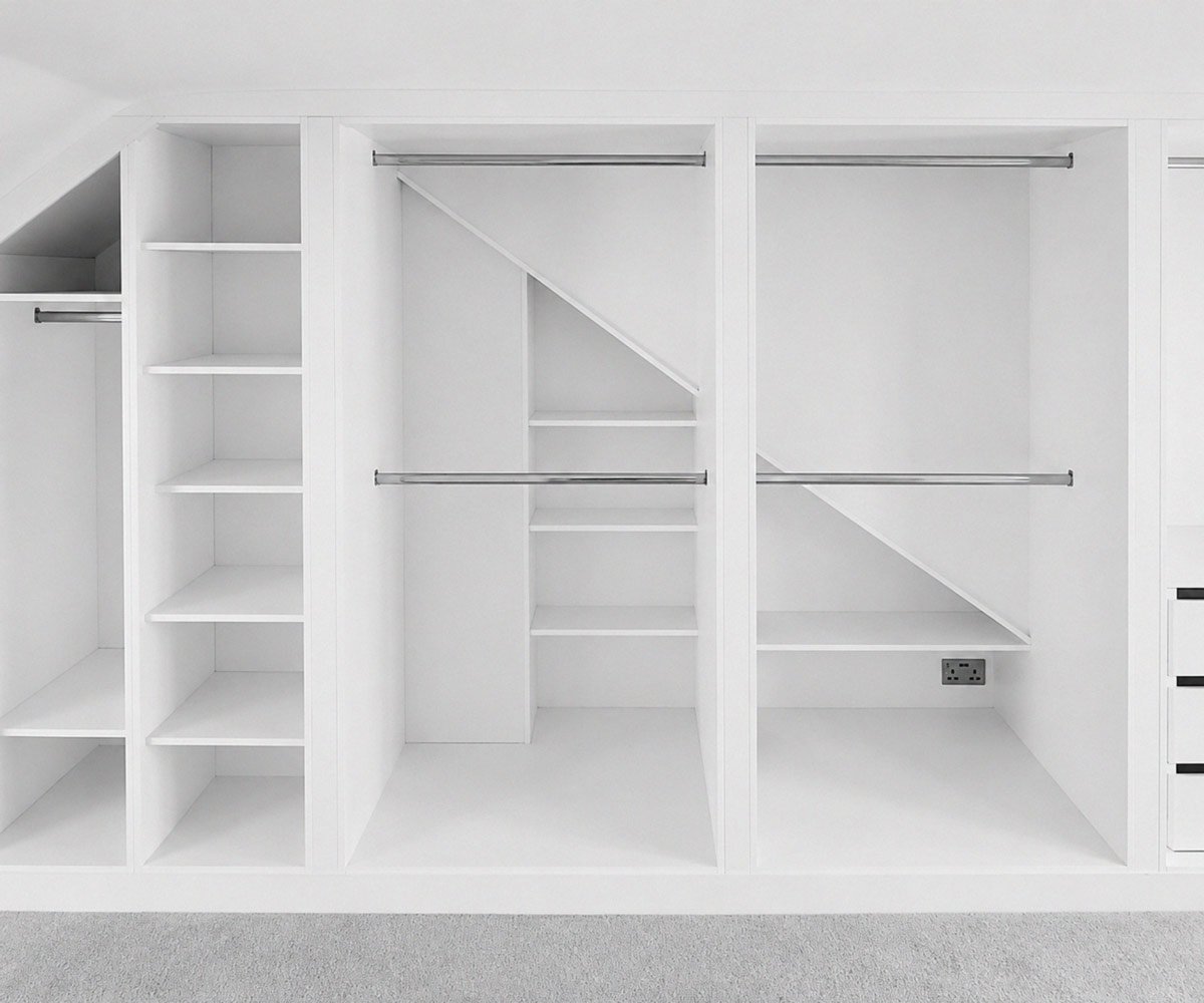 Interior of bespoke fitted bedroom wardrobe