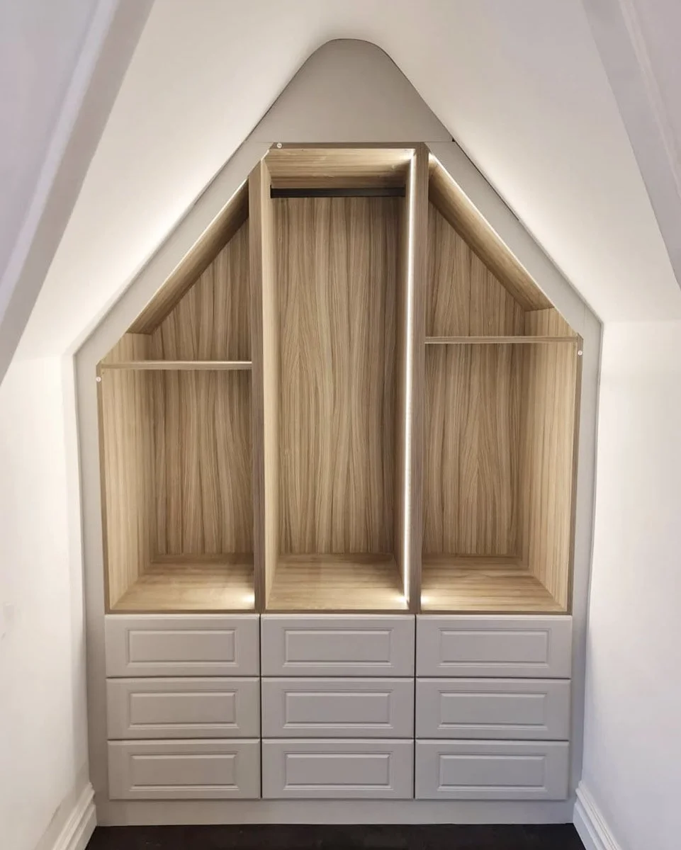 Fitted bedroom storage with interior lighting