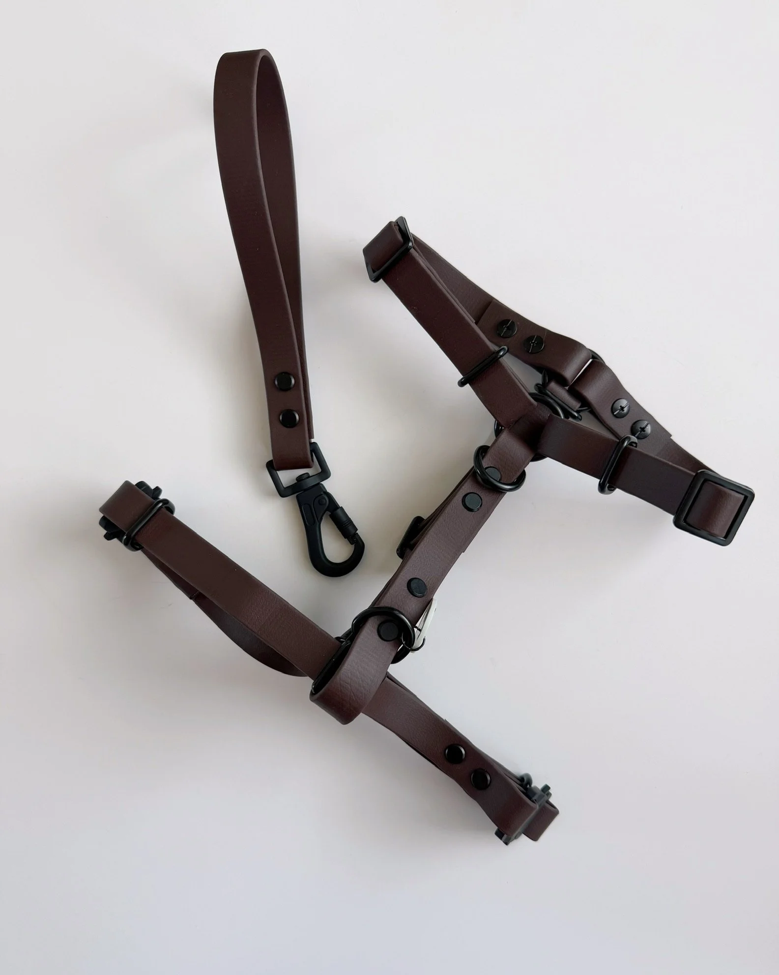 Biothane barrel dog harness in espresso with metal hardware, lay flat product view