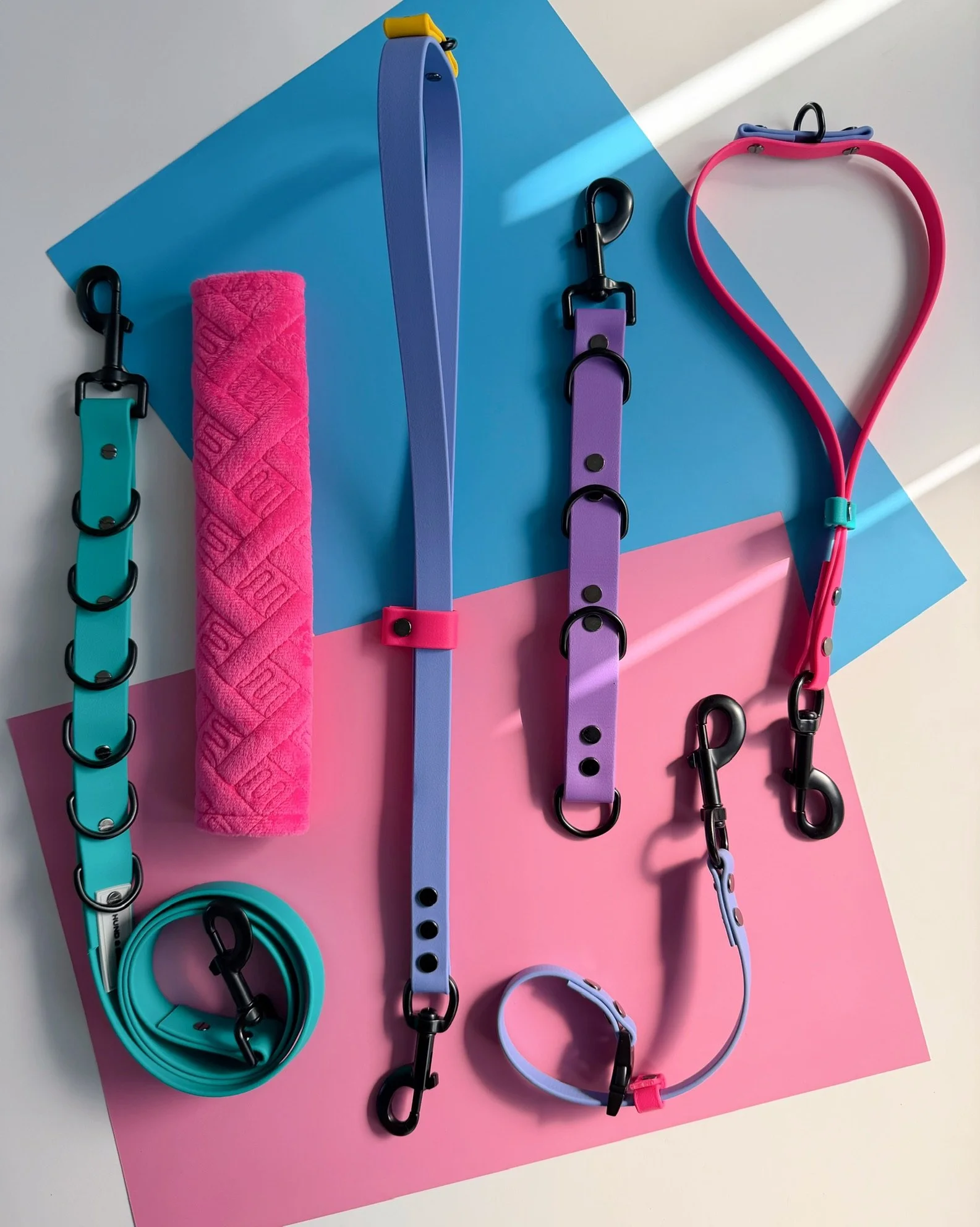 Professional biothane dog grooming bundle pieces including grooming loops belly band and extender straps in 90s inspired colours by Hund and Shore