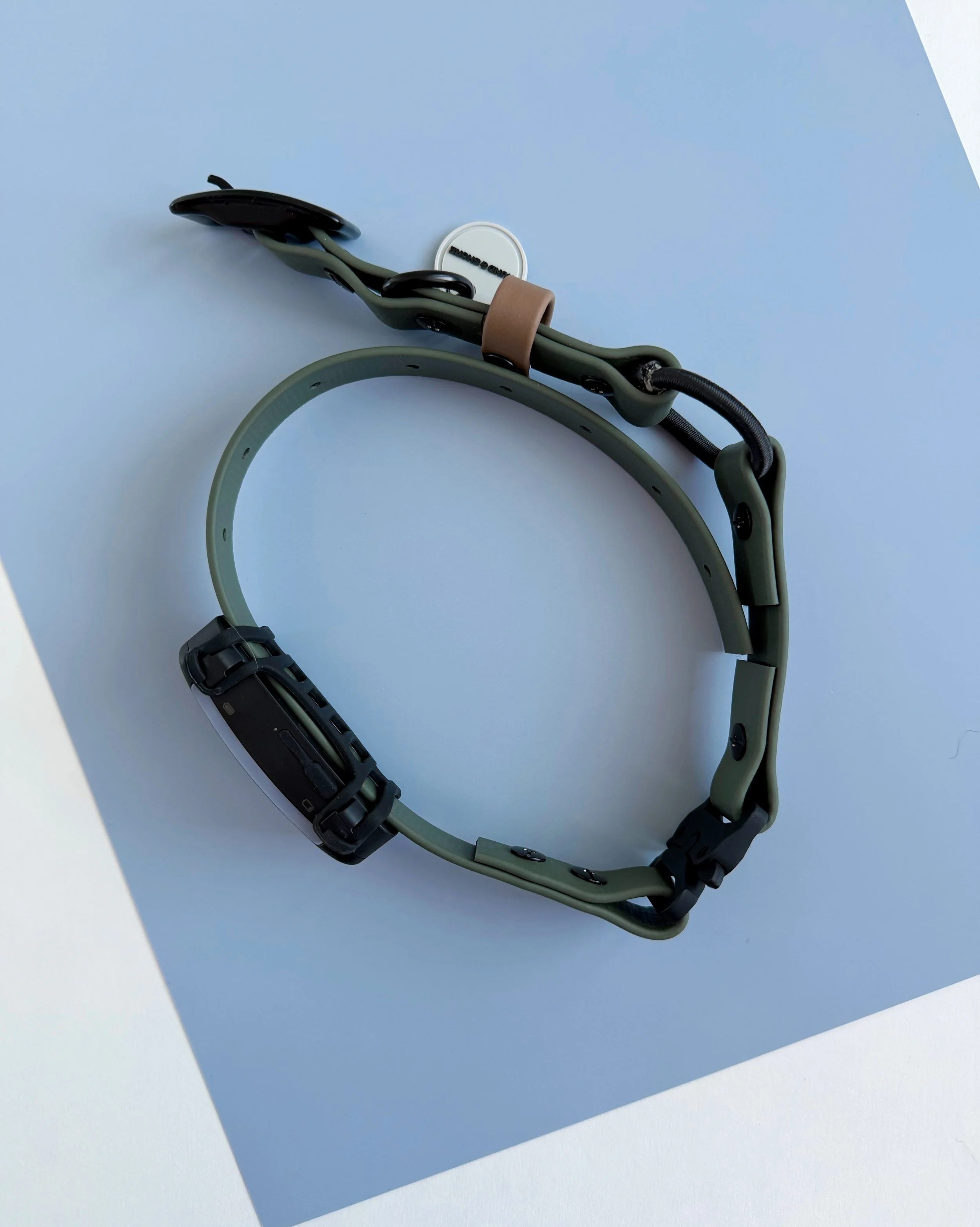 armin tracker mounted Premium biothane e-collar replacement strap in olive with black hardware and e-collar tracker attached