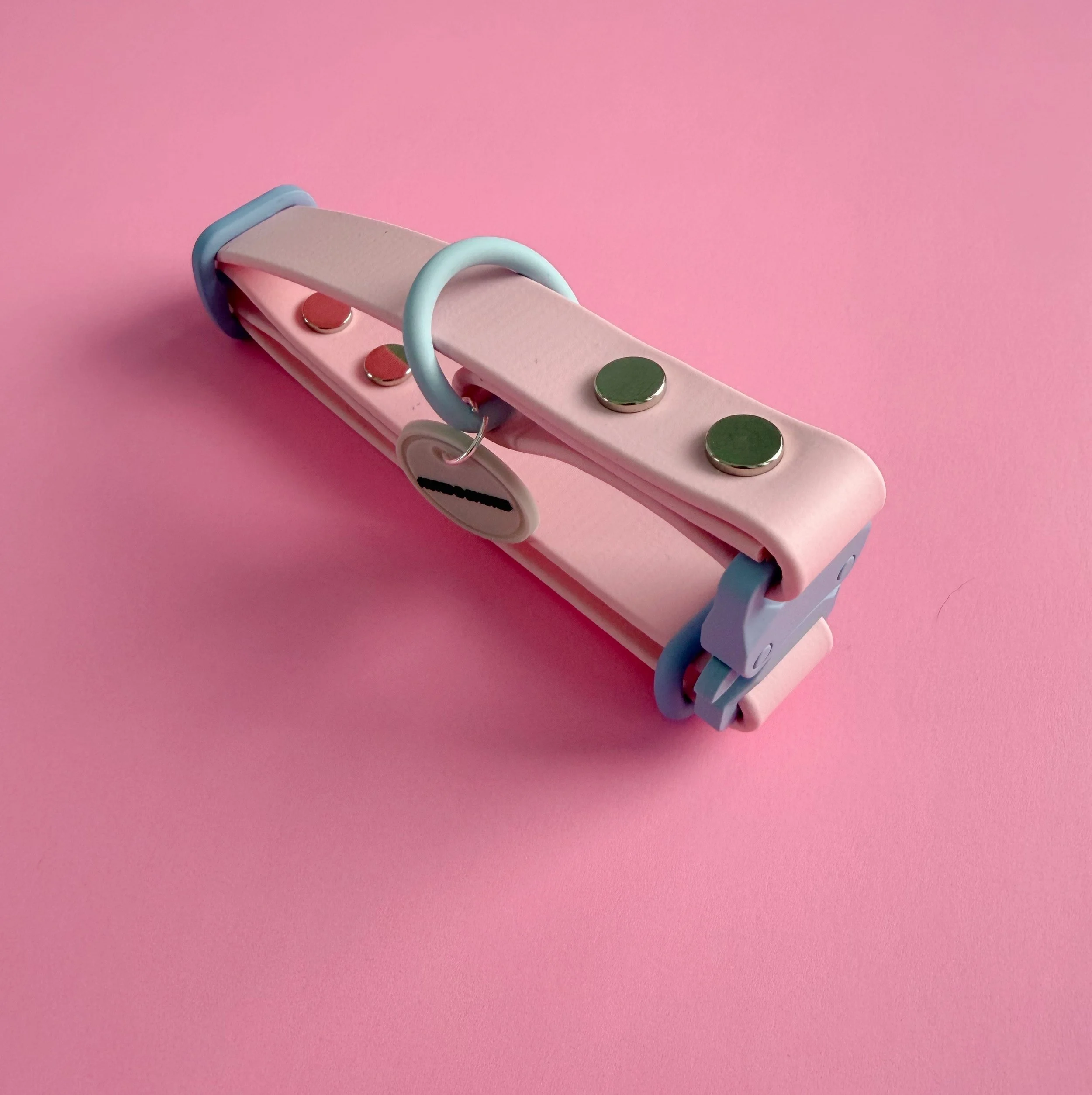 Après Pup Rosé powder pink waterproof dog collar with powder blue hardware from Alpine Ski Club collection