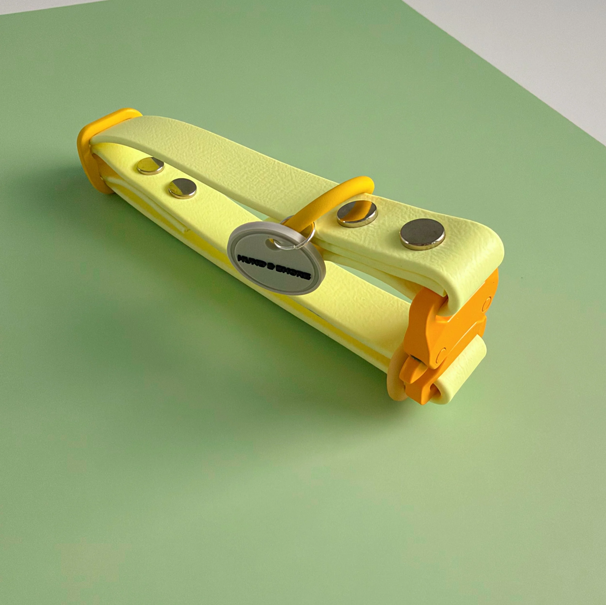 Pastel yellow dog collar with yellow hardware