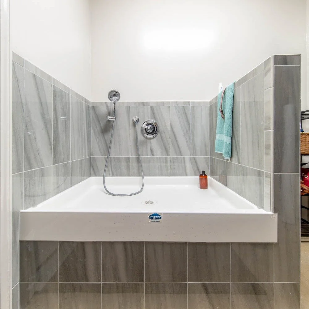 Can you guess what this is?! 🐶

At Jud Tile, no idea is too wild &mdash; we bring any vision to life. ✨

Case in point: this amazing client wanted a dog wash station in their home. 🐾 Challenge accepted! From concept to completion, we made it functi