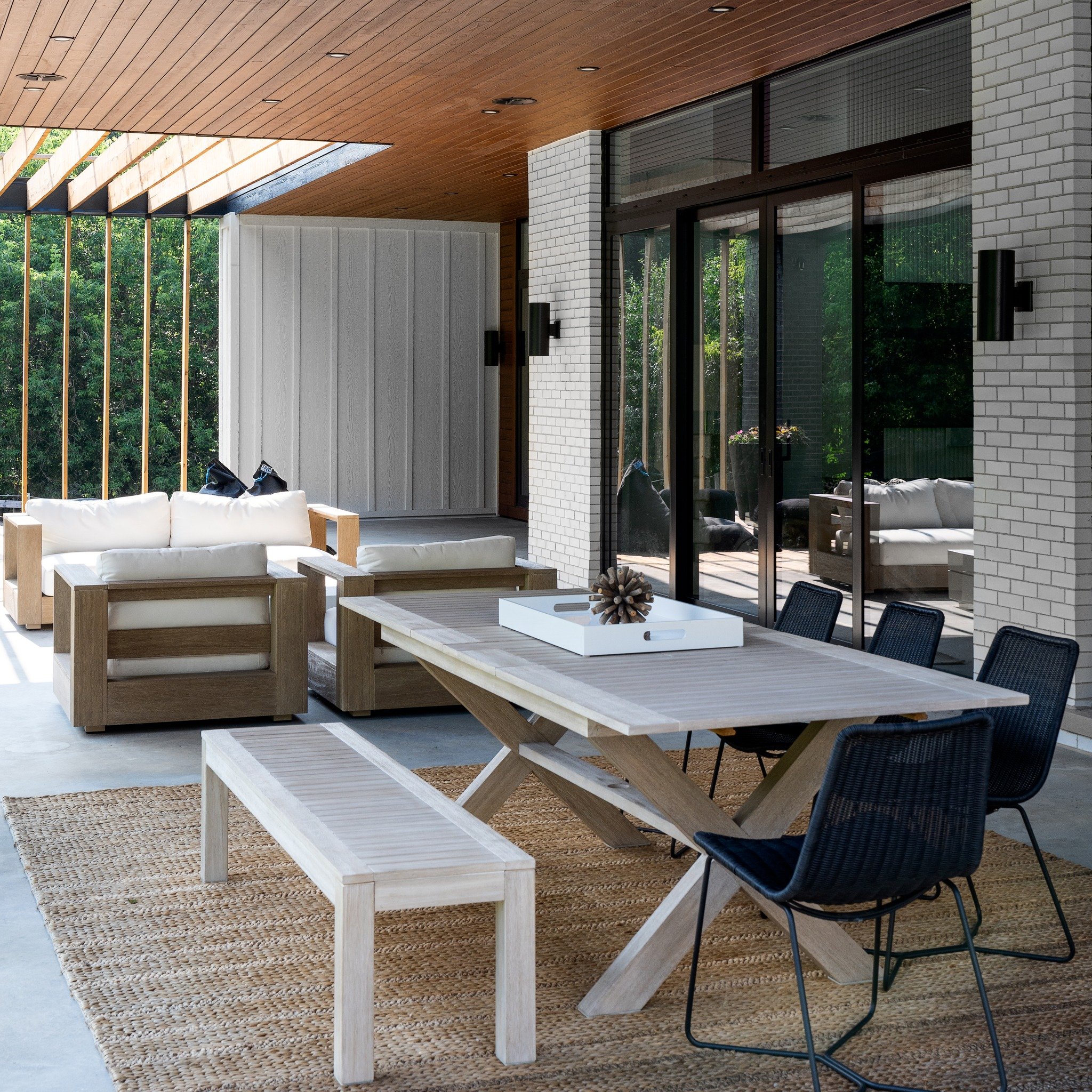 It is almost patio weather and this covered patio is giving our client everything that they envisioned; from an outdoor kitchen, dining area, sitting area with a beautiful fireplace from @dreamcastdesign for the colder days to the serene outdoor yoga