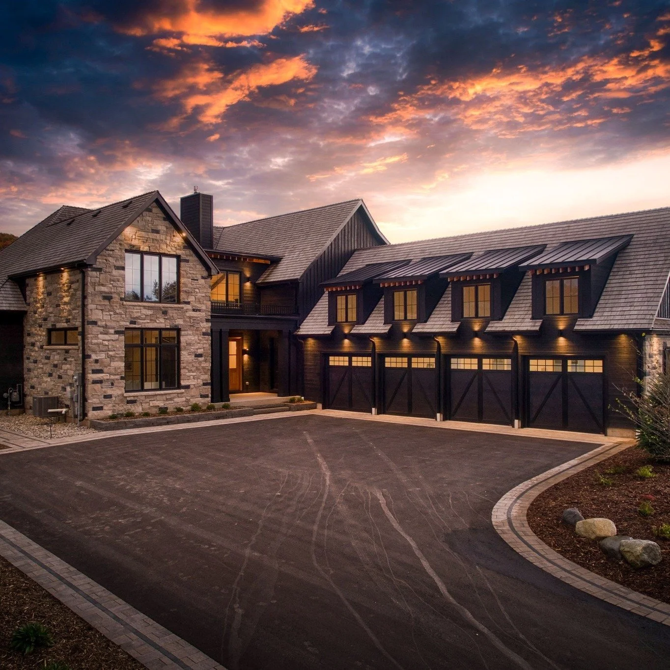 Picture-perfect in every sense. ✨
This home comes alive at sunset &mdash; the dark, layered stone catching the last light of the day and glowing with quiet strength. A timeless silhouette, designed to feel grounded, warm, and effortlessly elegant as 