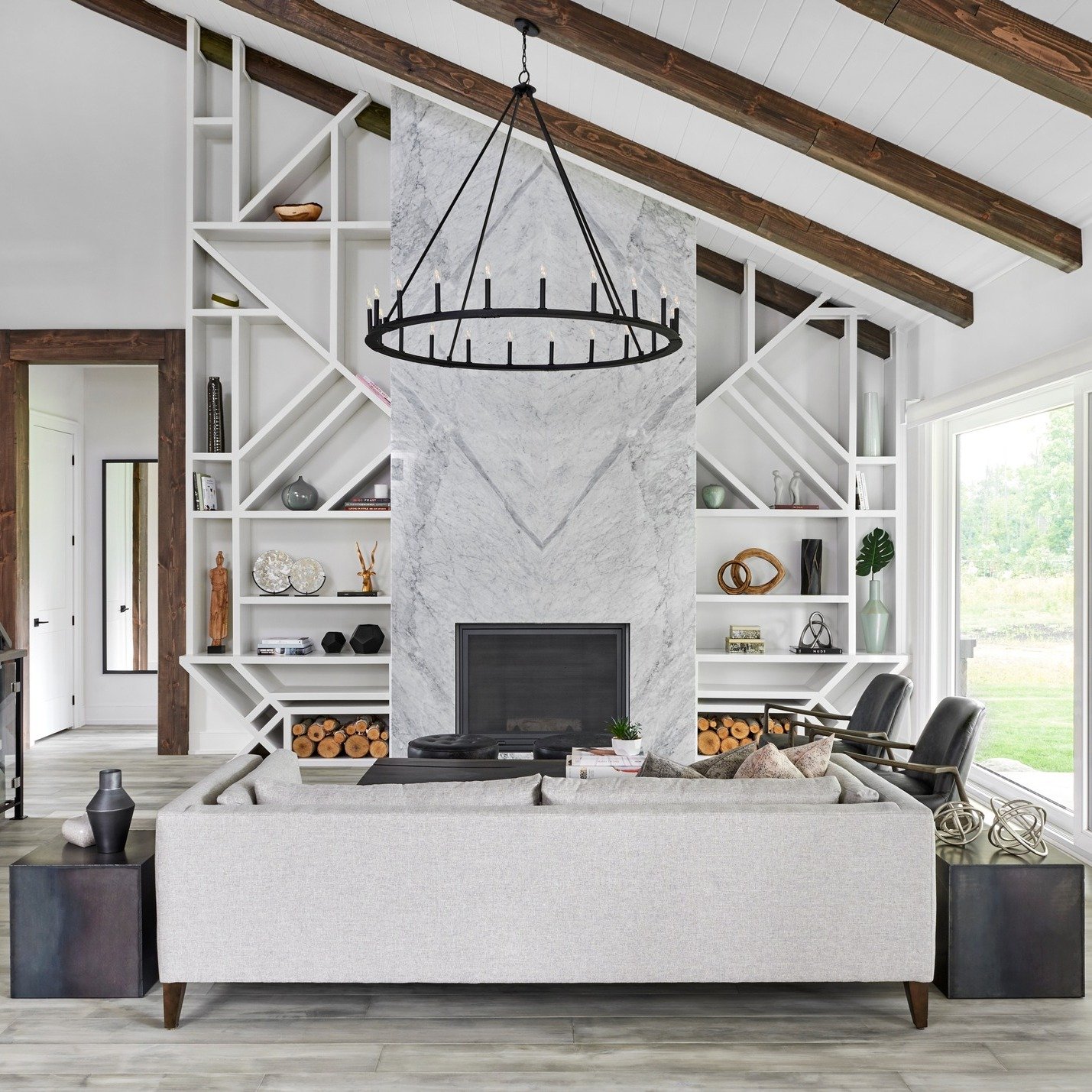 Ceilings really don&rsquo;t get enough credit.

This white, slanted wood ceiling instantly changes how the space feels &mdash; light, open, and warm. The wood faux beams add just enough detail to give it character without overcomplicating it. Simple 