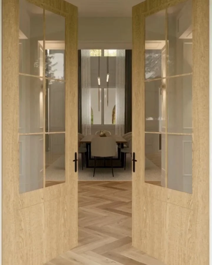 Walking into this space, you notice the architecture first.

Two-storey ceilings soar overhead, creating a sense of openness and drama, while carefully proportioned windows frame light and nature like living art. Modern clean lines meet traditional f