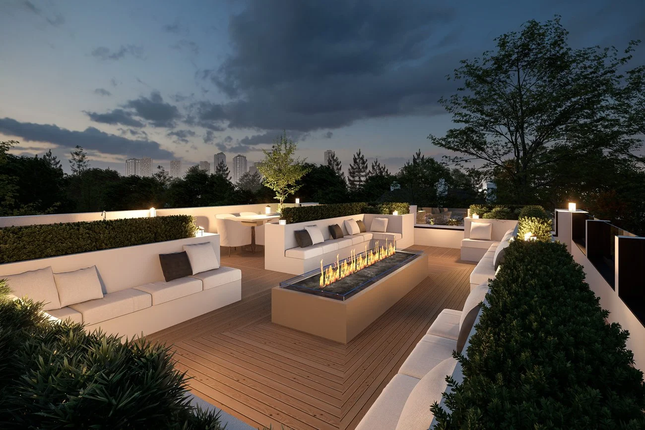 the rooftop patio at night with the fireplace lit on top of the Meadow Wood residential architectural project in Mississauga, Ontario