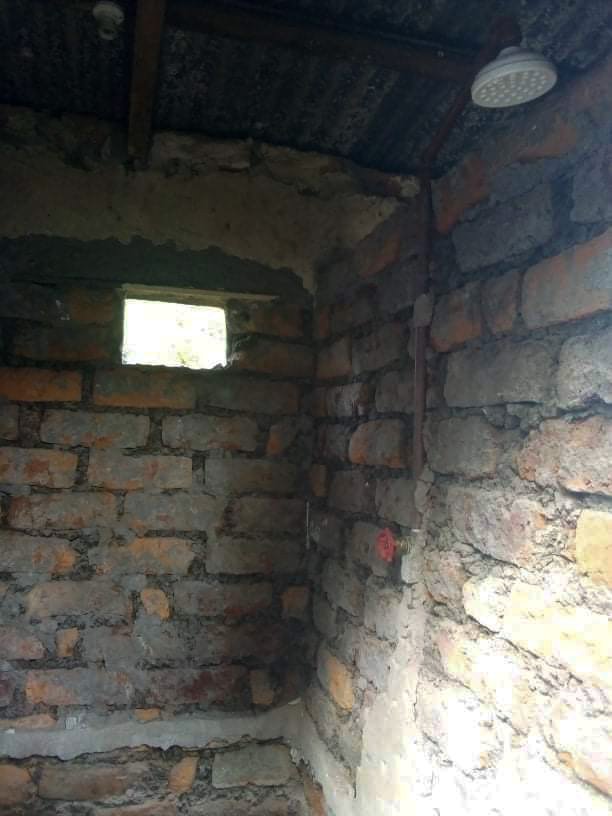 Inside of original rustic shower stall