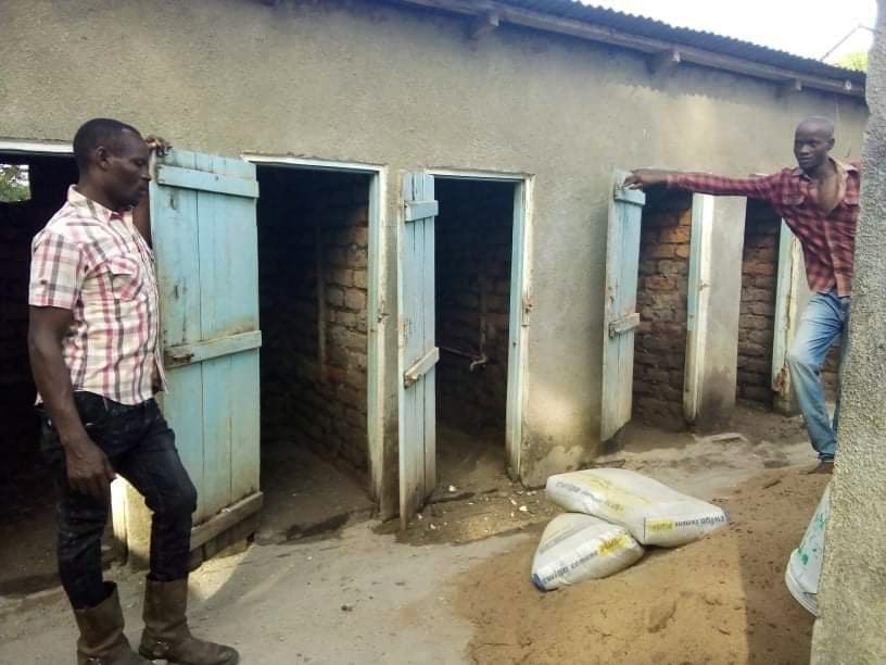 Outside of the original rustic shower stalls