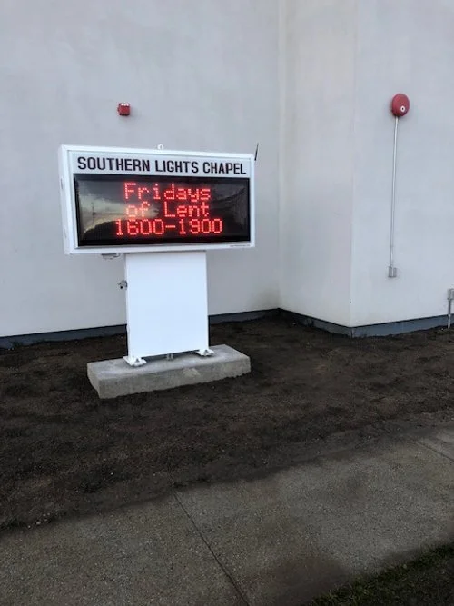 Ft. Wainwright replace sign base and sidewalk