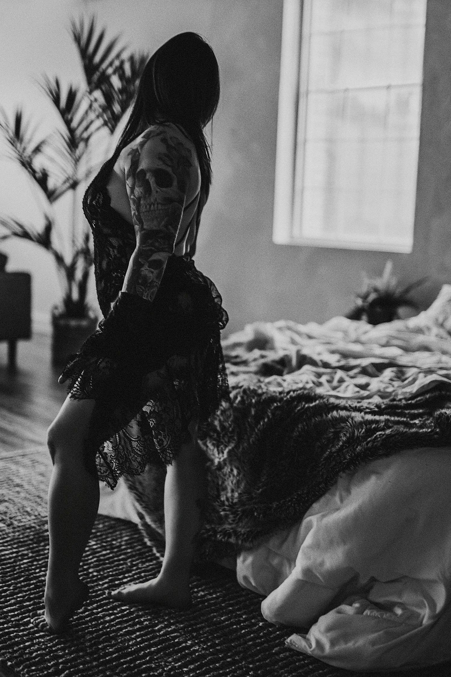  woman in black lace lingerie in studio for empowering session 