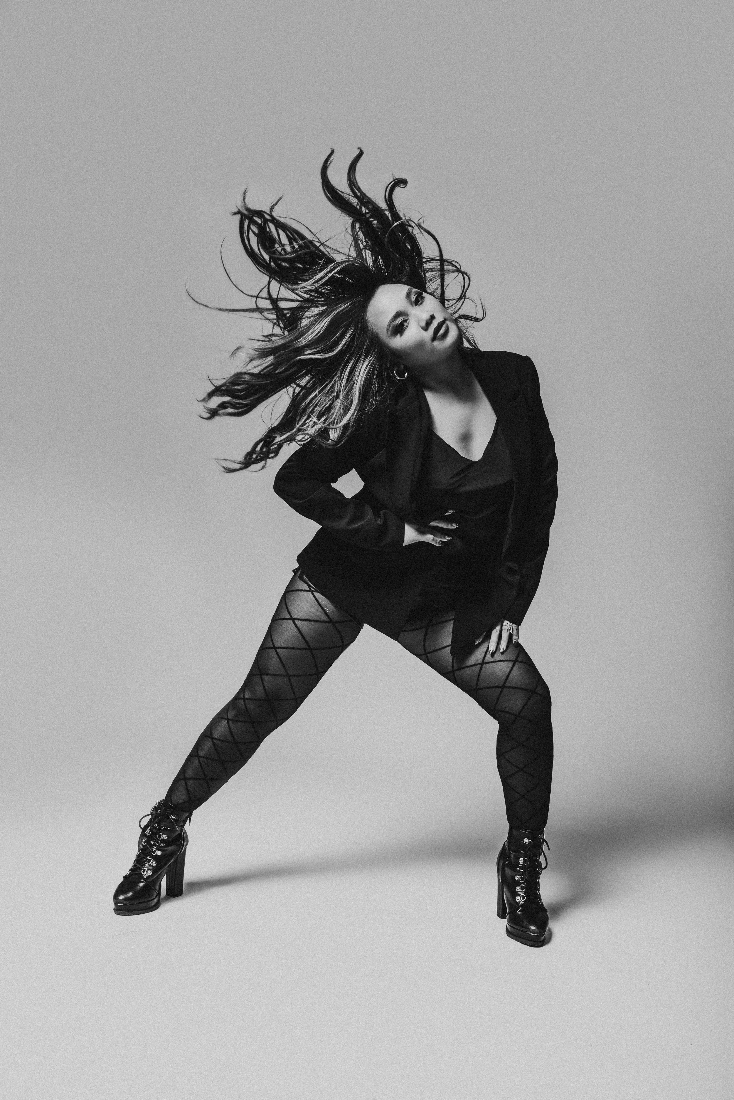 woman in tights and blazer in Hananh Mac Studios